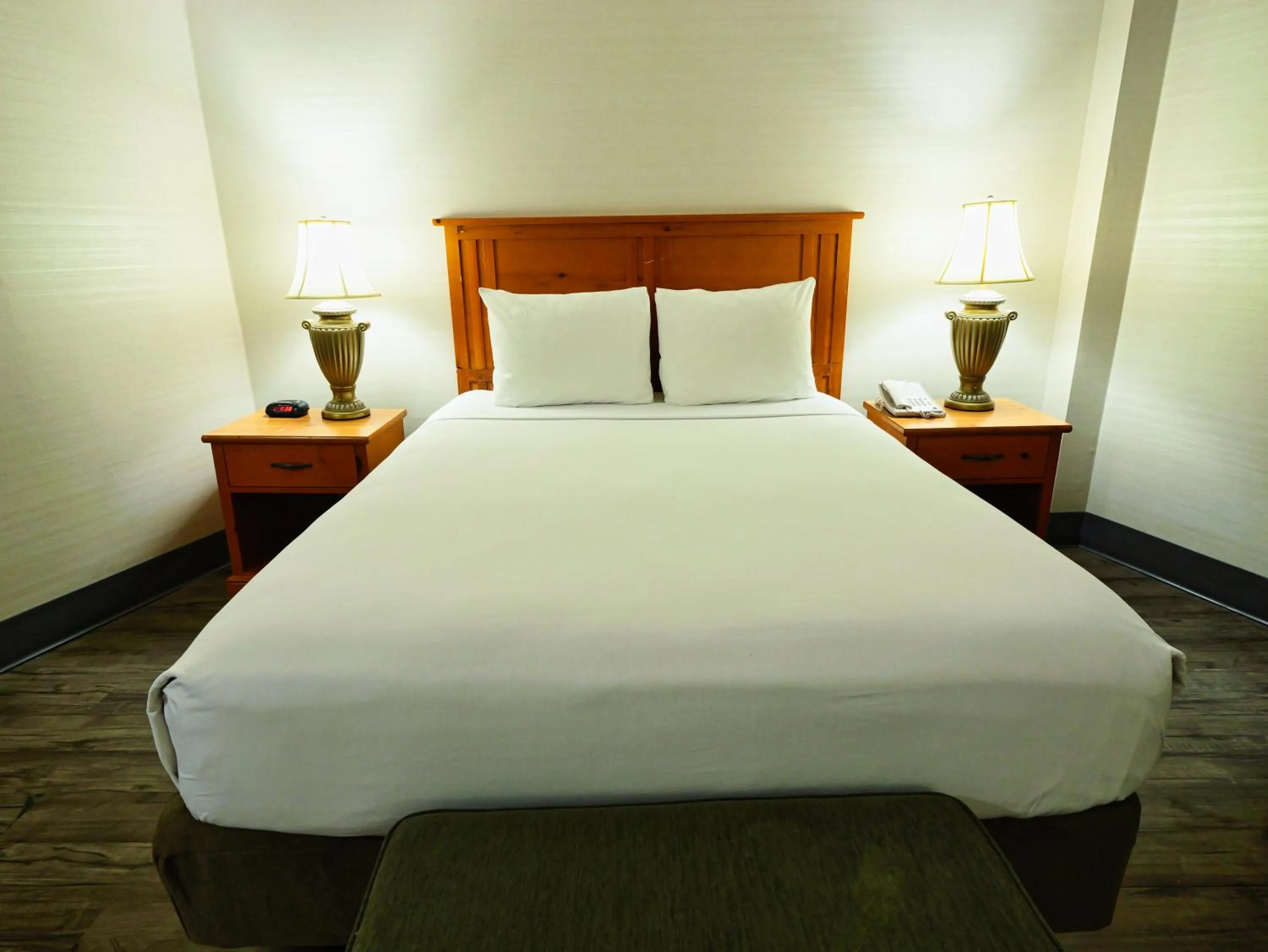 Bed in Continental Inn & Suites