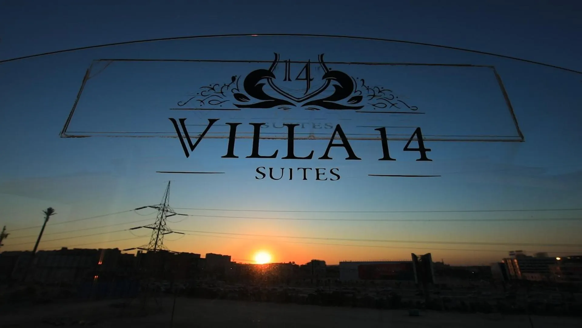 Property logo or sign in Villa 14 Suites