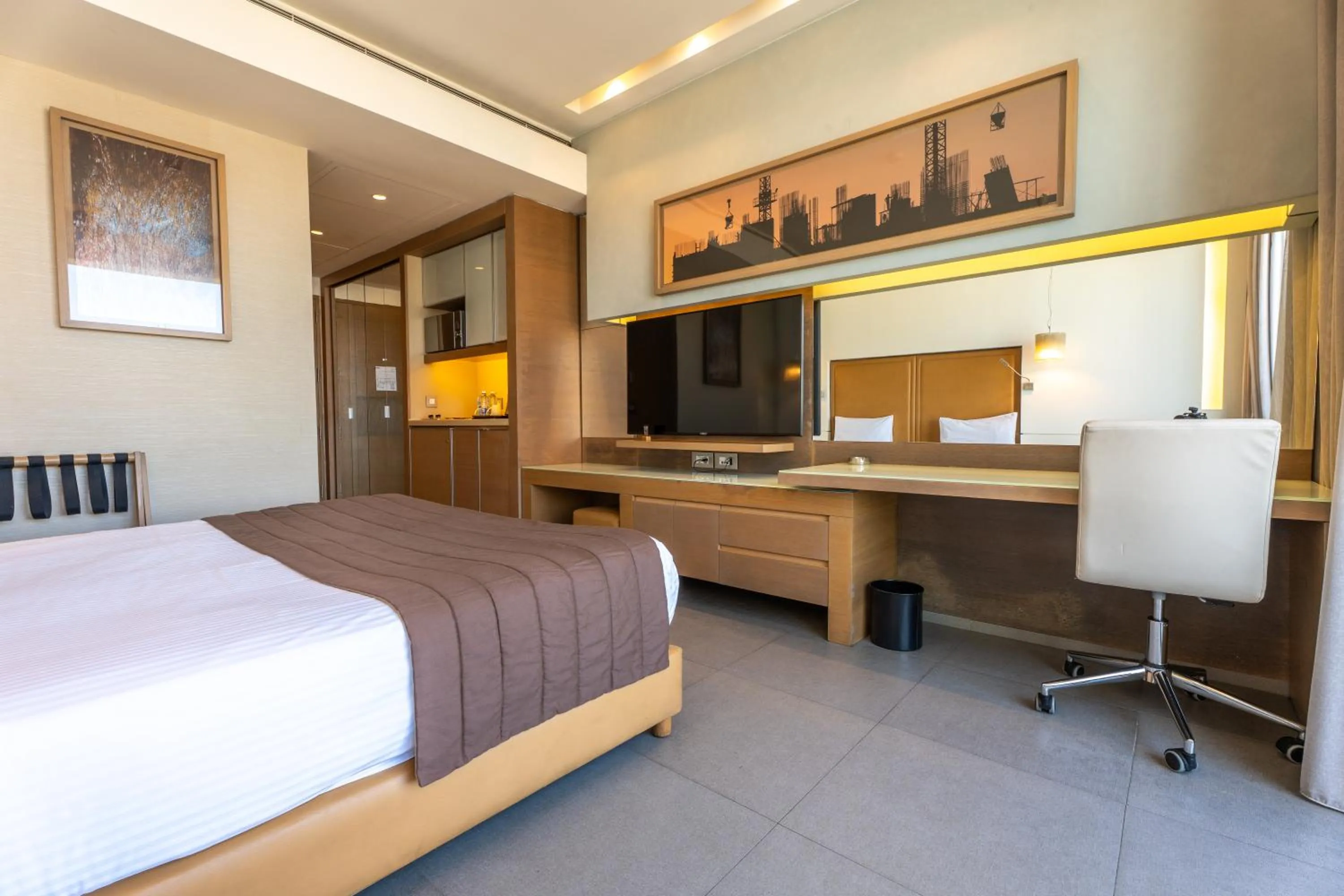 Bed in Saifi Suites Hotel