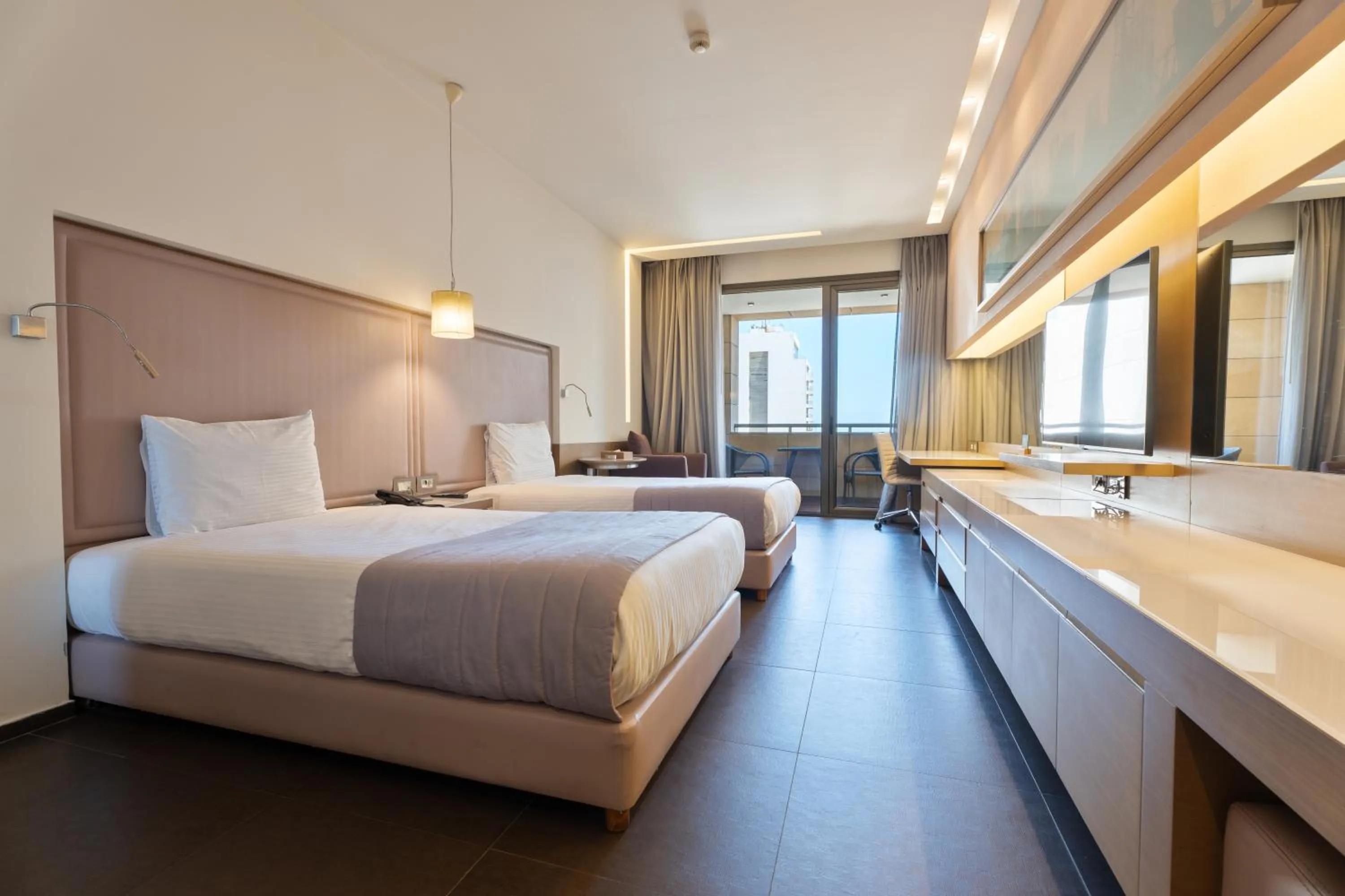 Bed in Saifi Suites Hotel