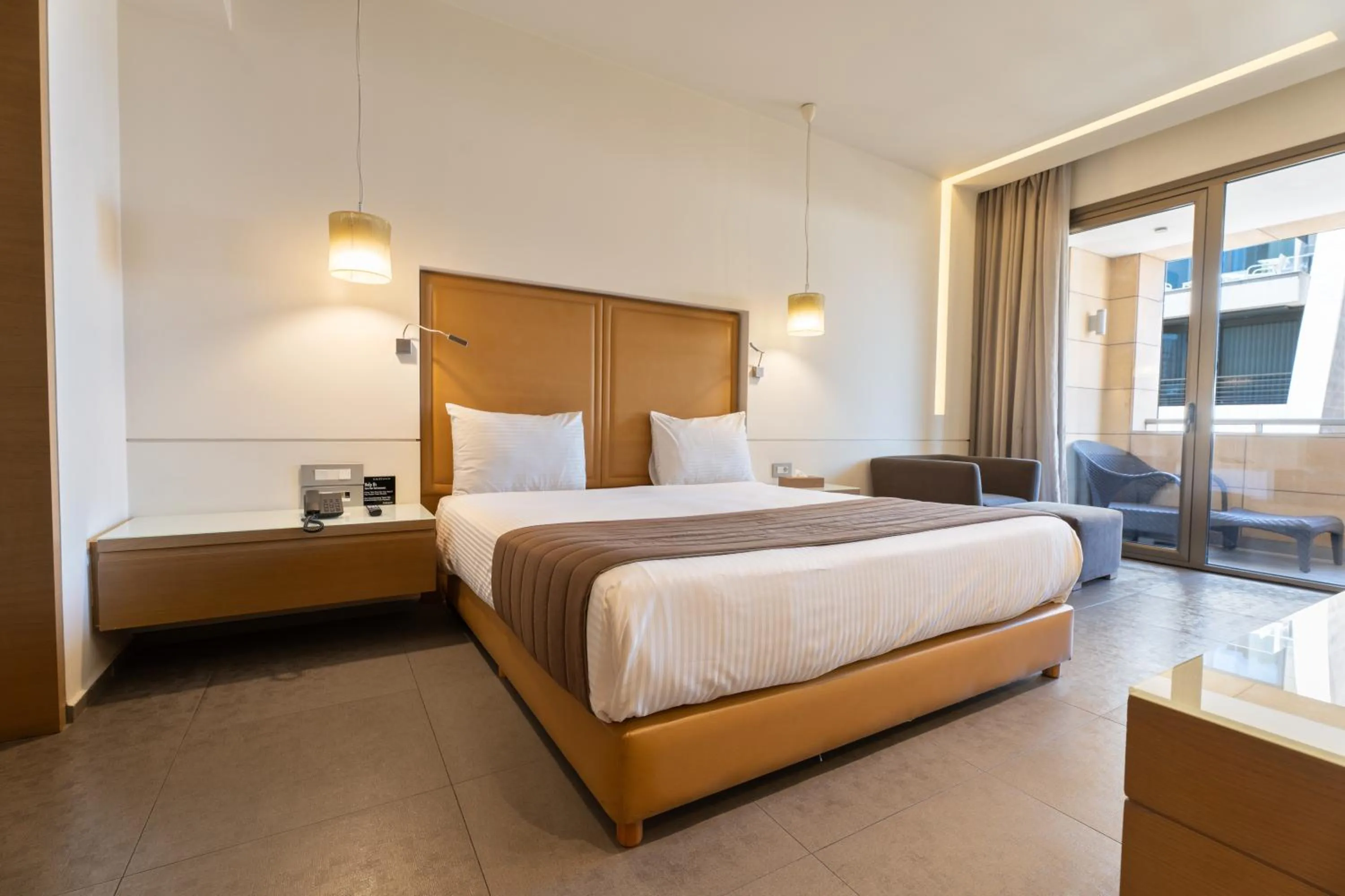 Bed in Saifi Suites Hotel