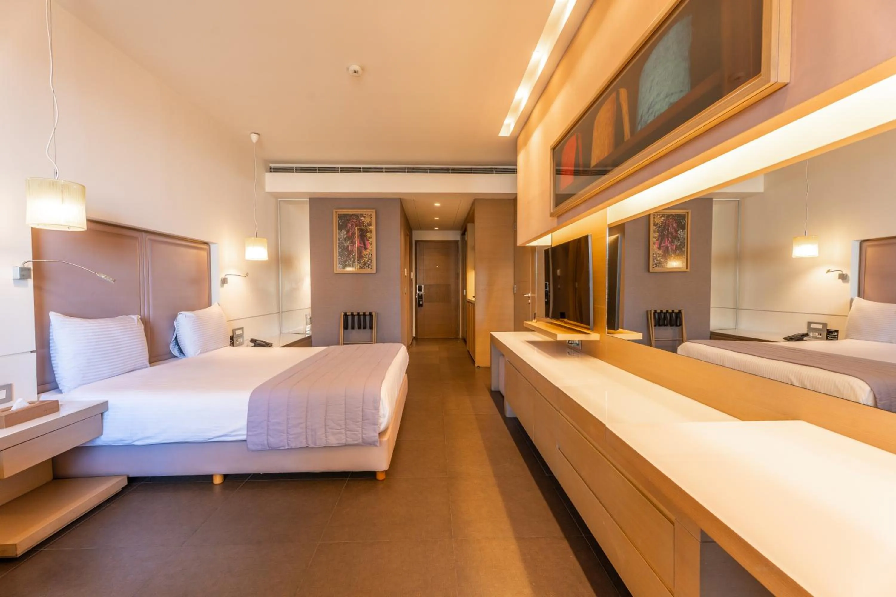 Bed in Saifi Suites Hotel