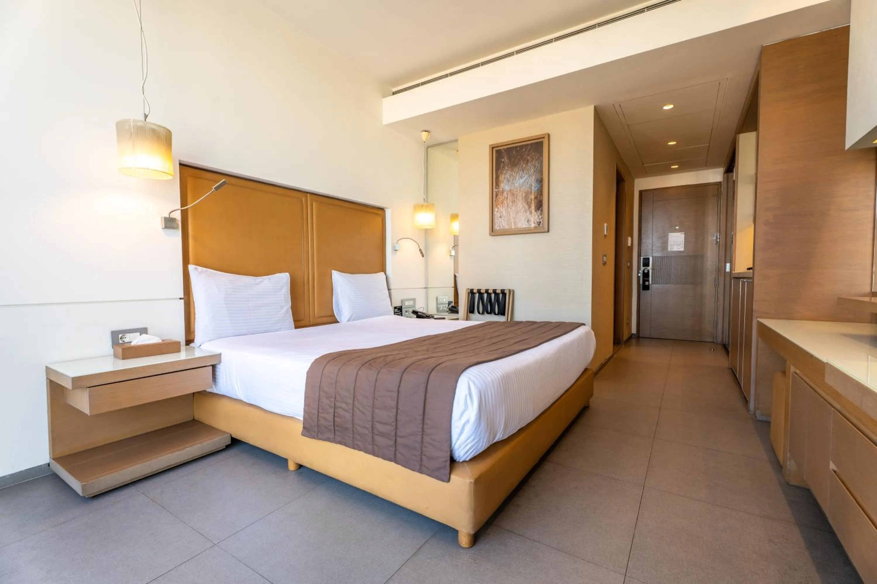 Bed in Saifi Suites Hotel