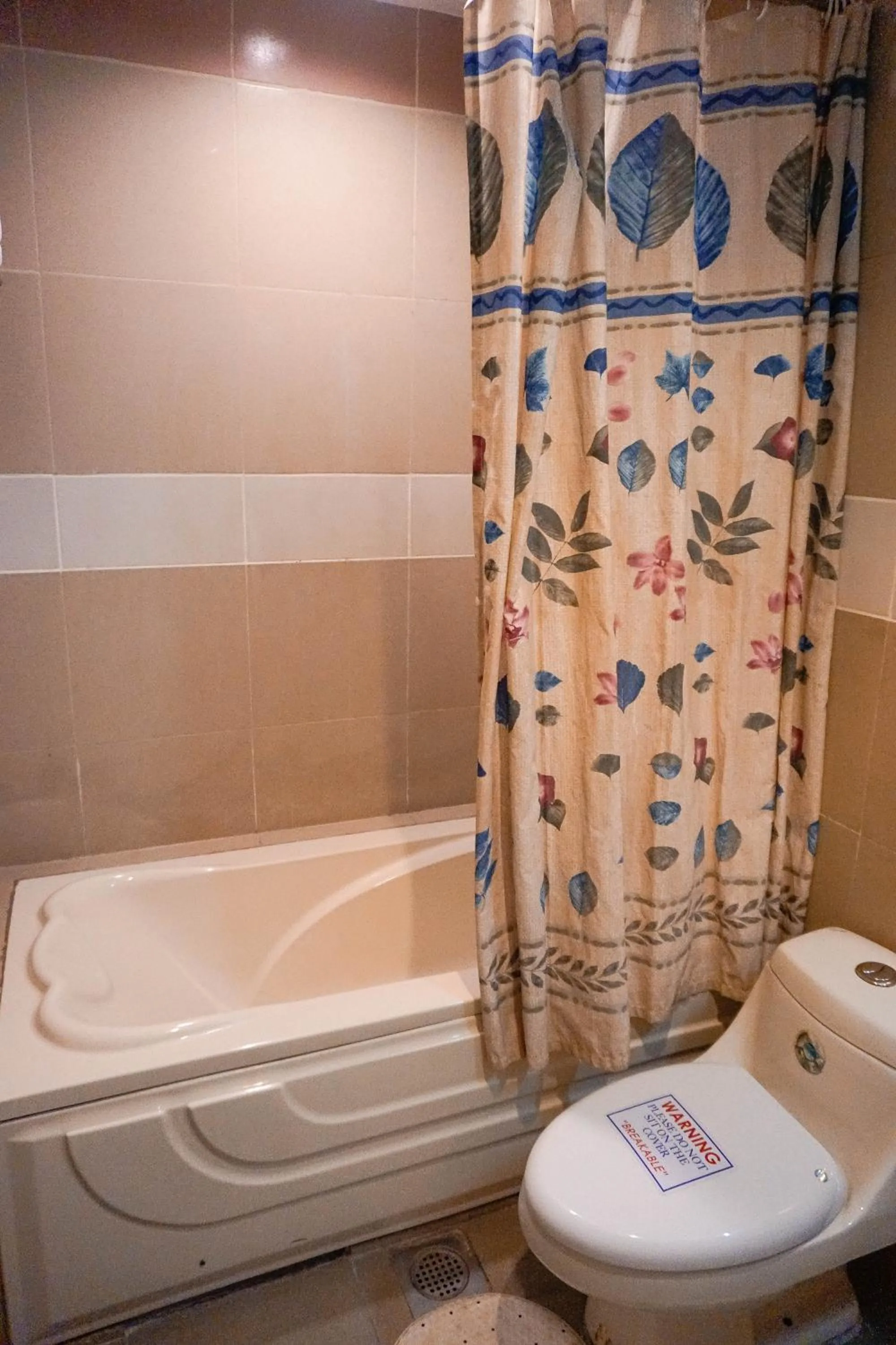 Toilet in Crowne Garden Hotel