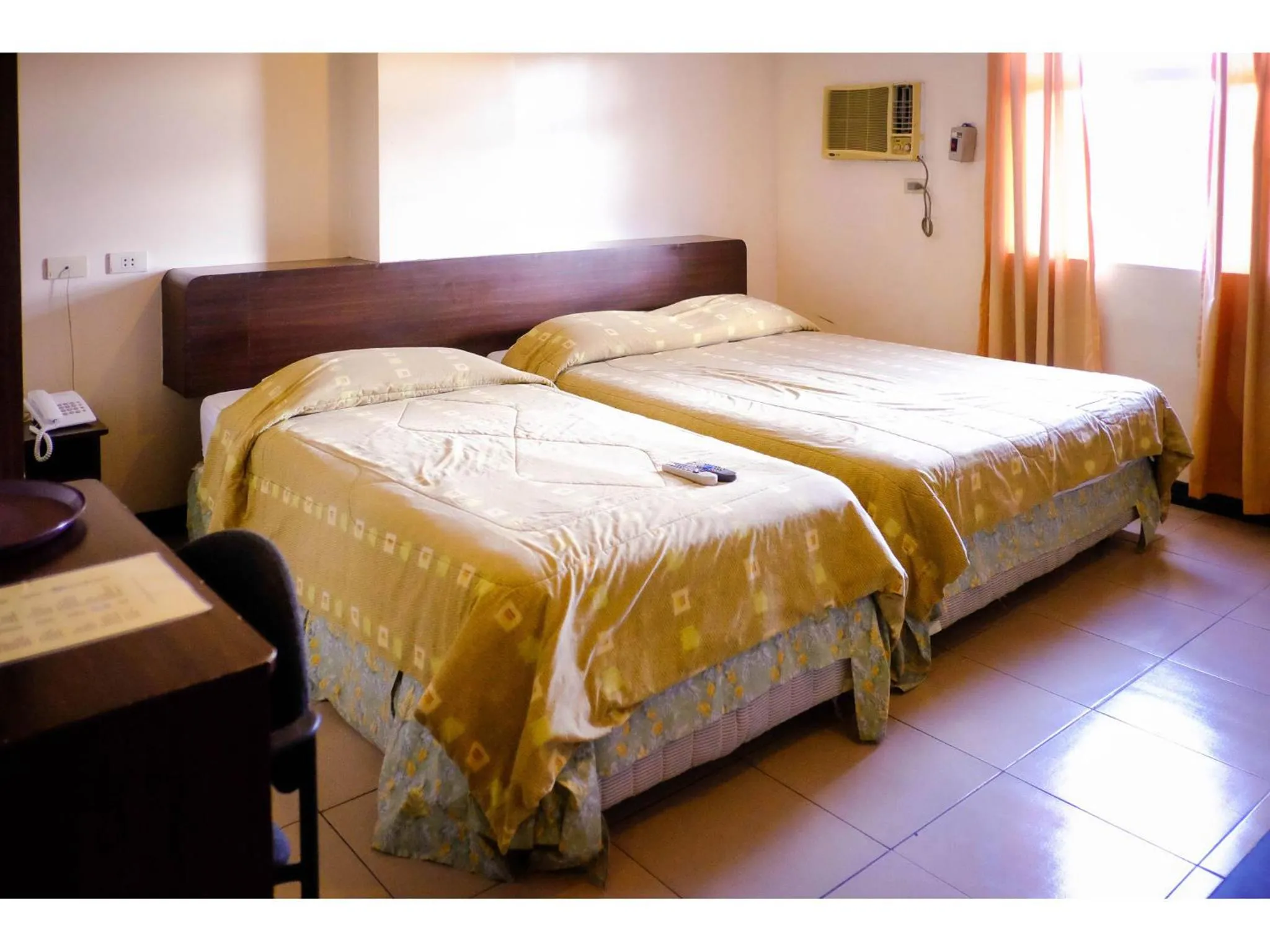 Bed in Crowne Garden Hotel