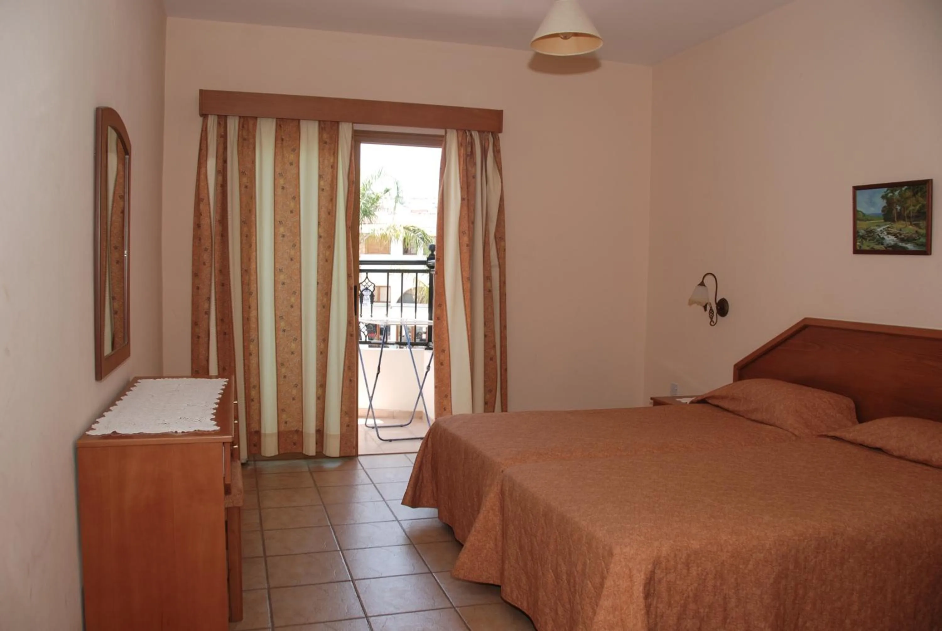 Bed in Kotzias Beach Apartments