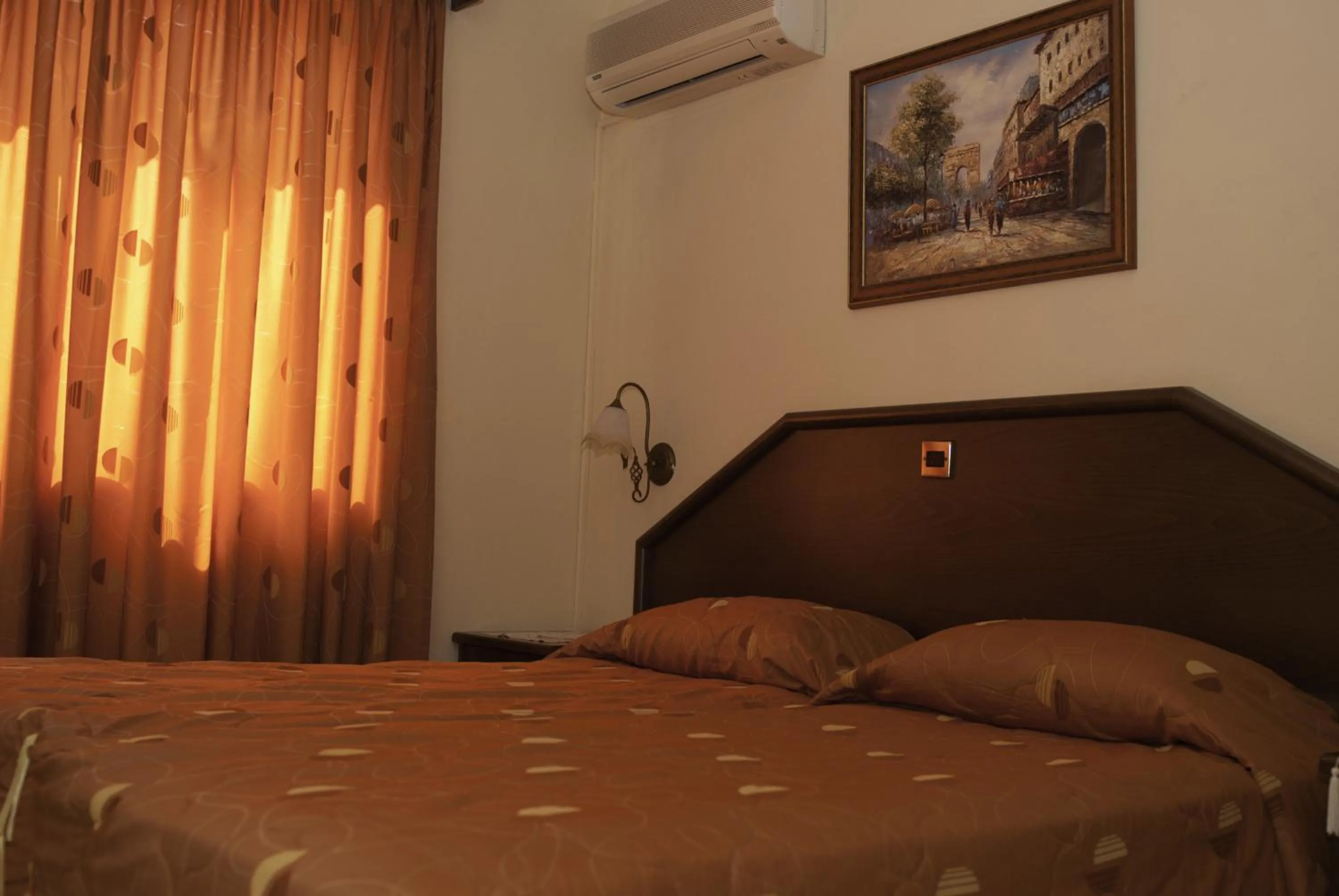 Bed in Kotzias Beach Apartments