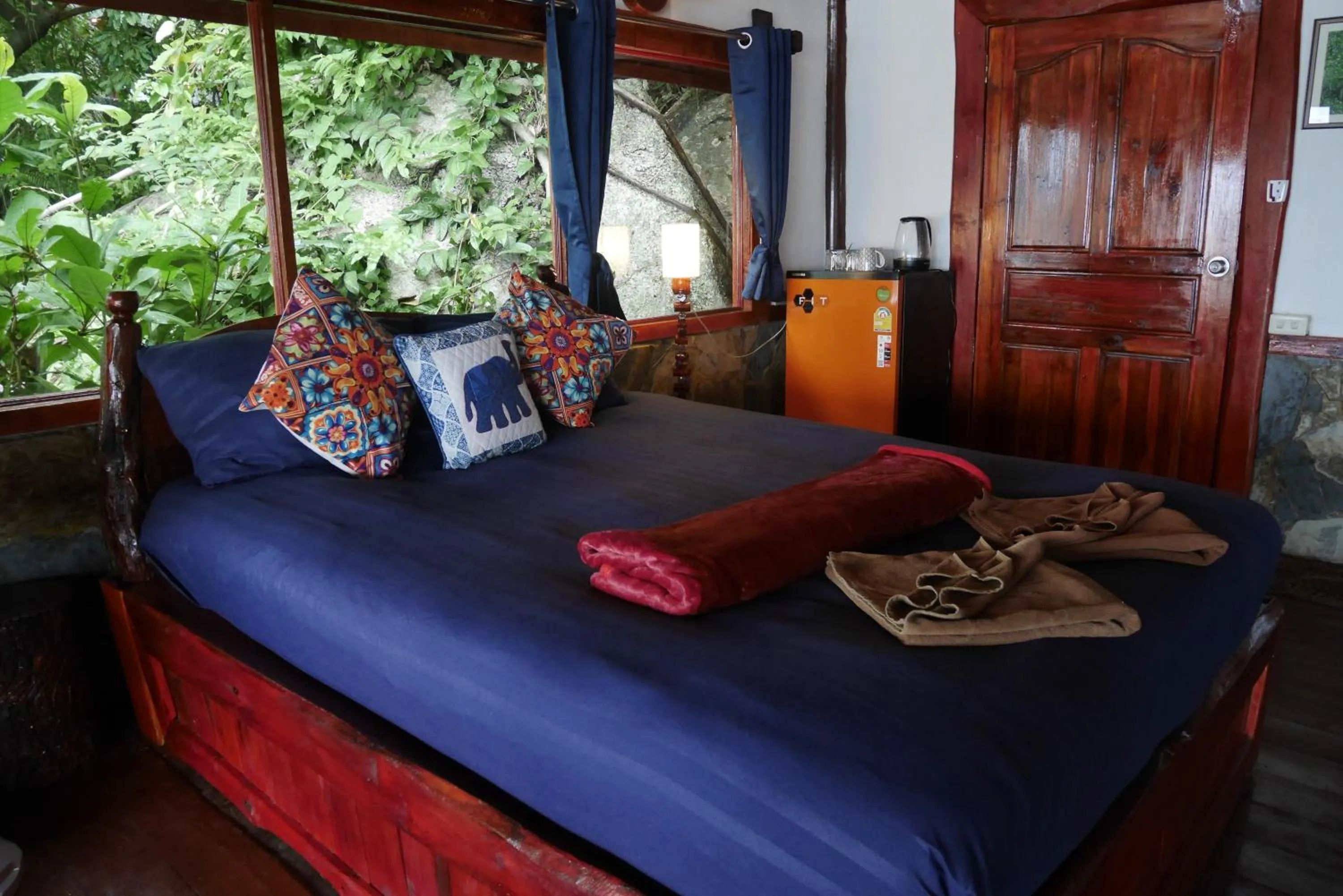 Bed in Mai Pen Rai Bungalows