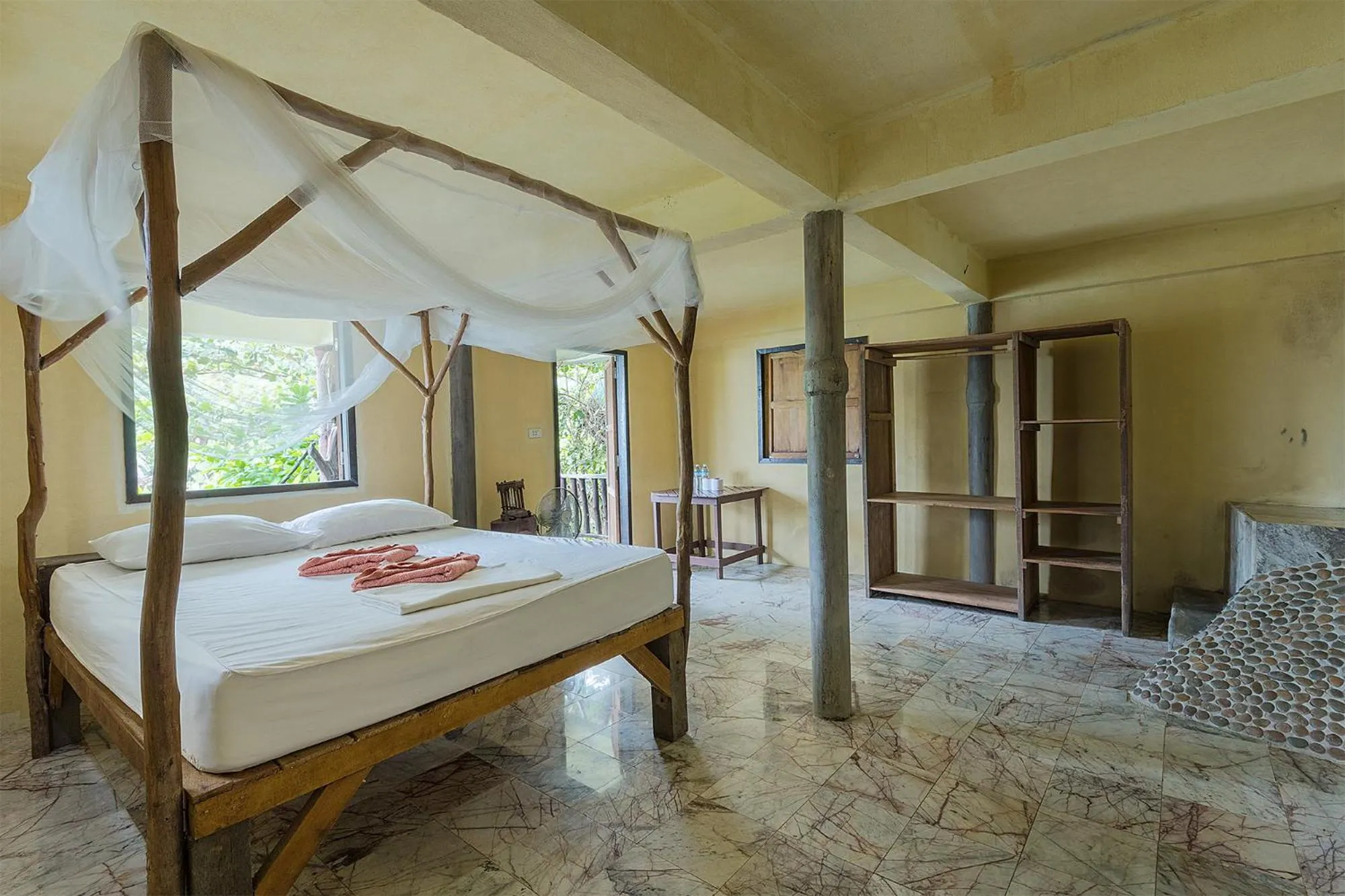 Bed in Mai Pen Rai Bungalows