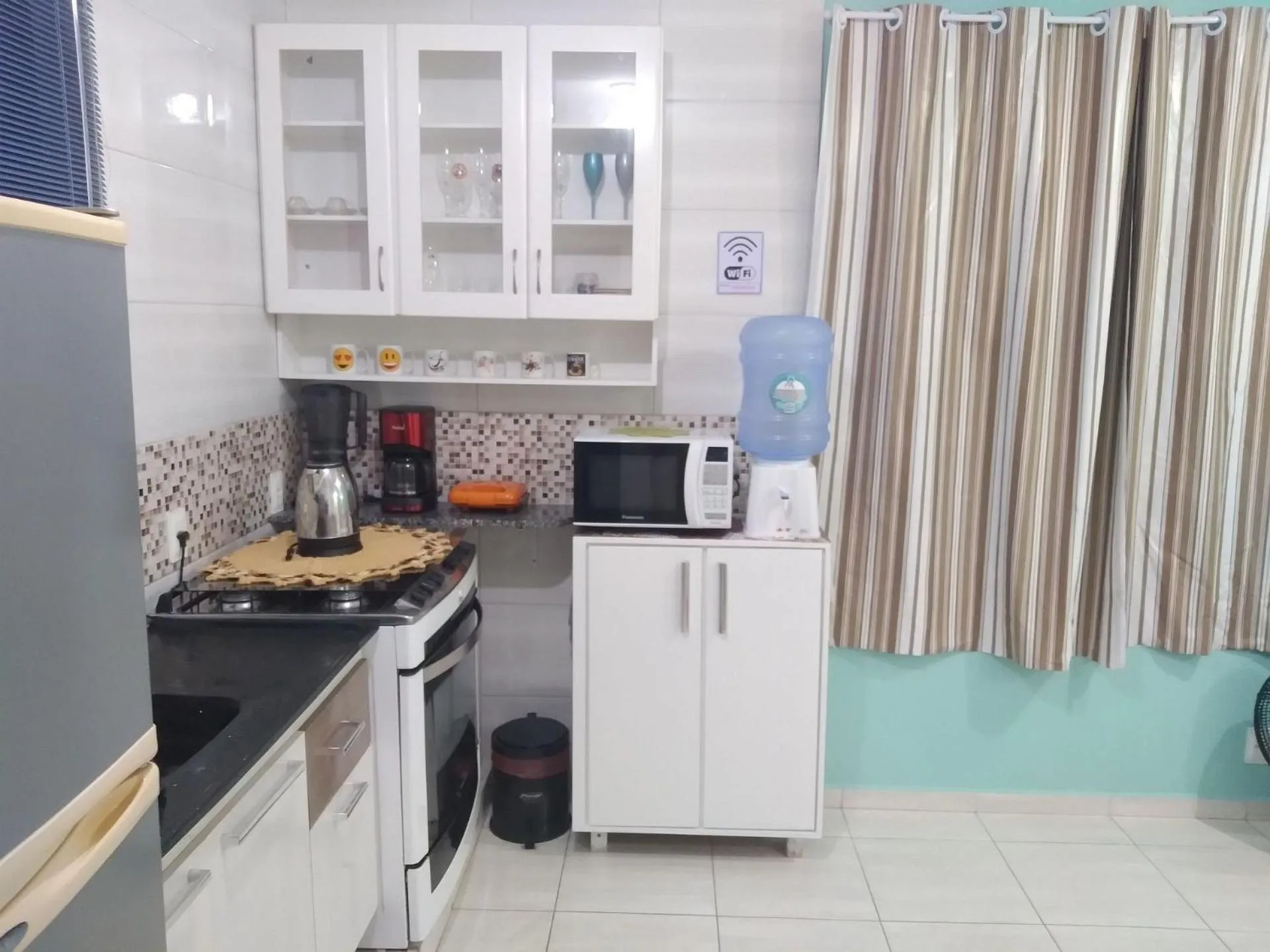 Kitchen or kitchenette in Pousada Souza