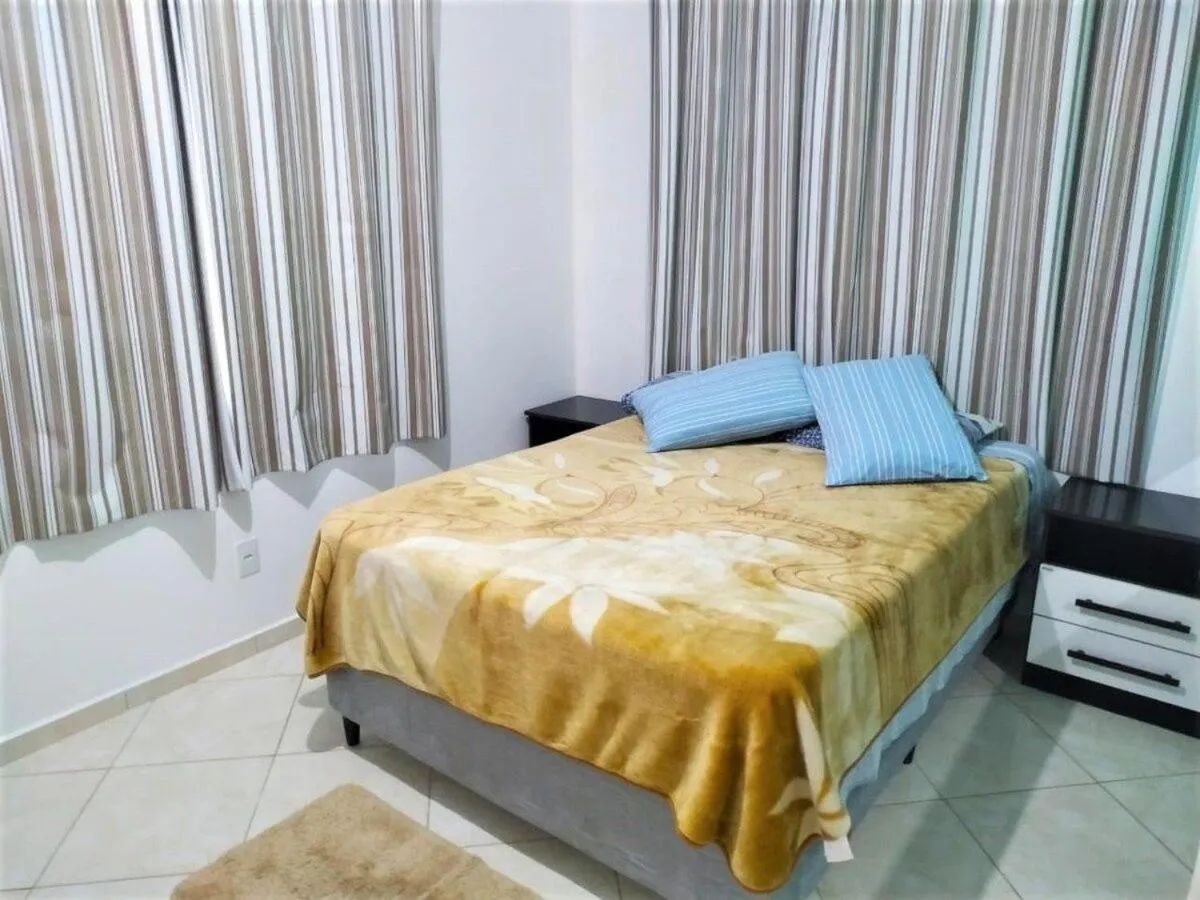 Bed in Pousada Souza