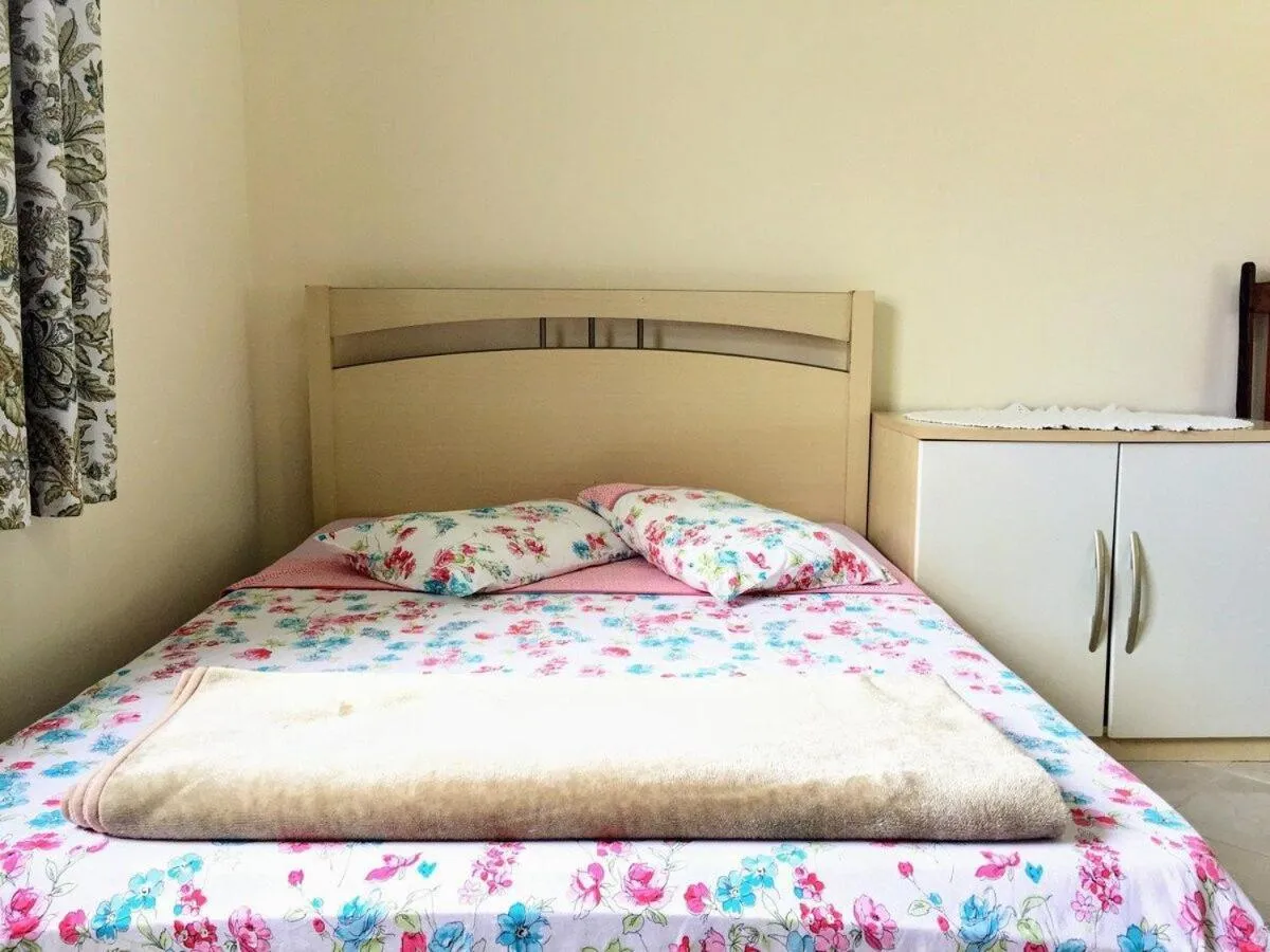 Bed in Pousada Souza