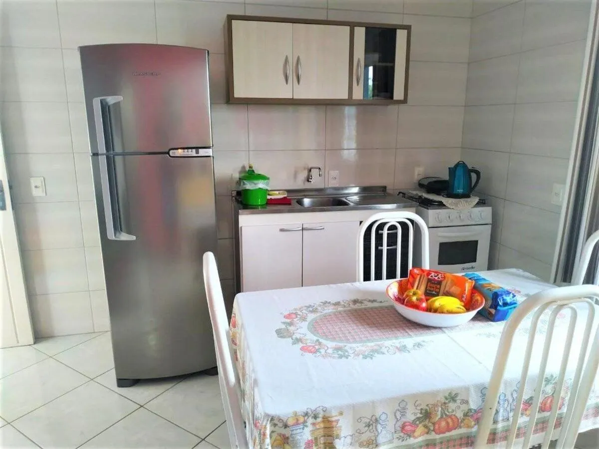 Kitchen or kitchenette in Pousada Souza