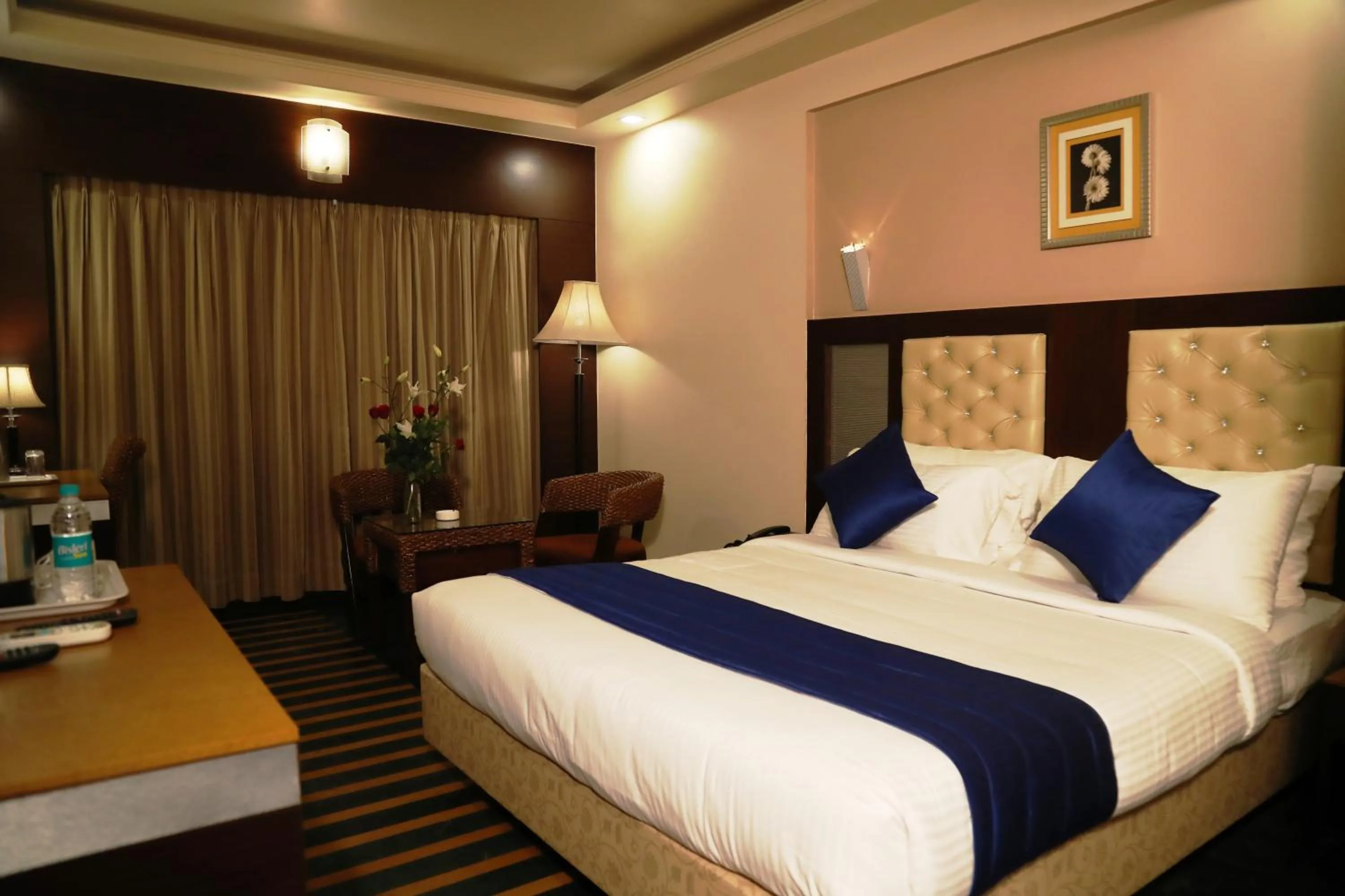 Photo of the whole room, Bed in Hotel Dr Rajkumar International