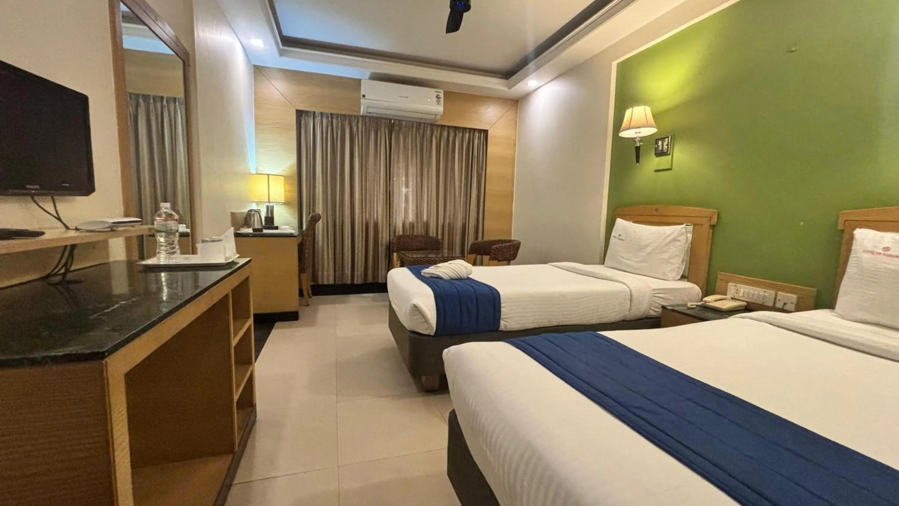 Bed in Hotel Dr Rajkumar International