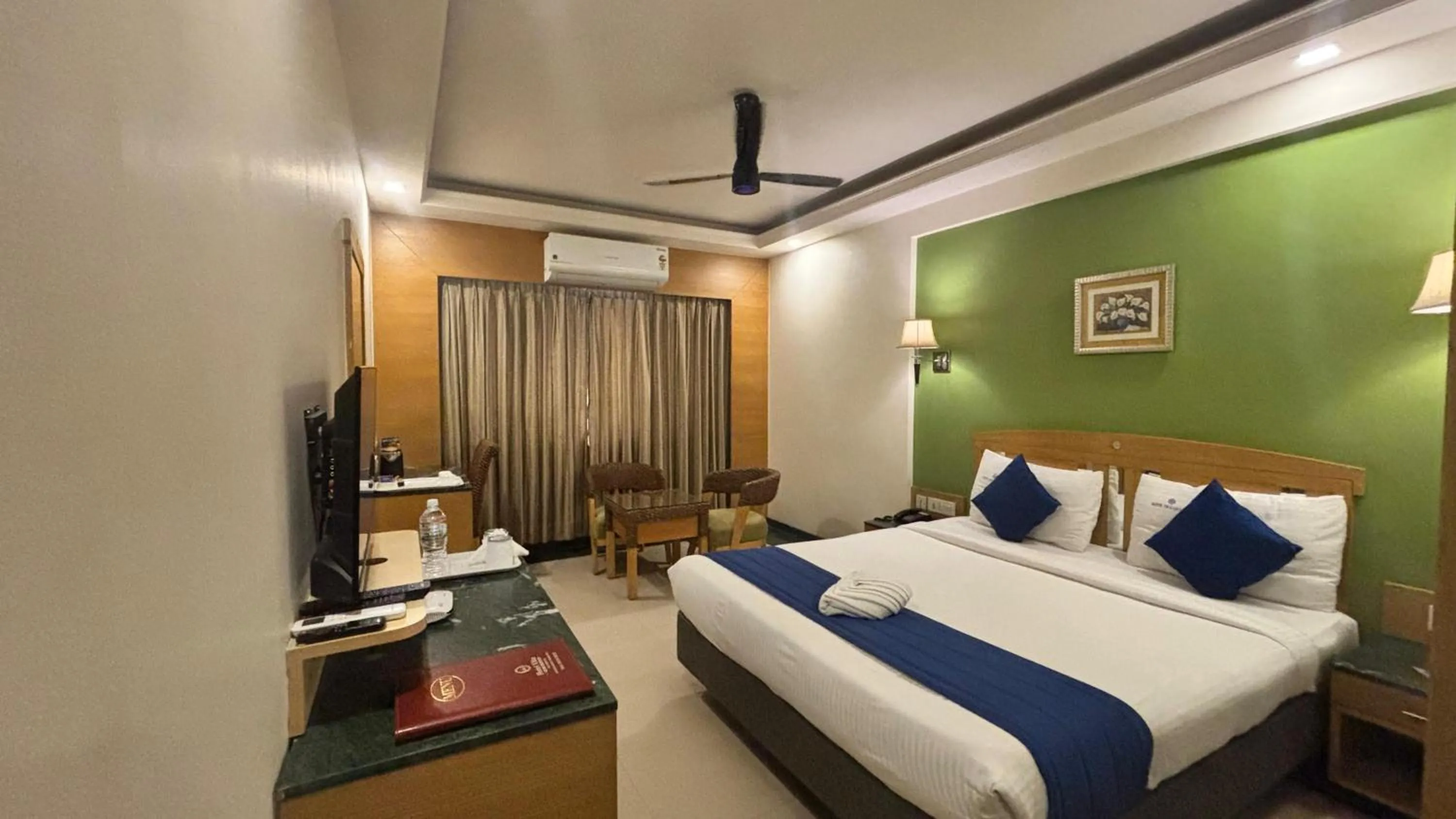 Bed in Hotel Dr Rajkumar International