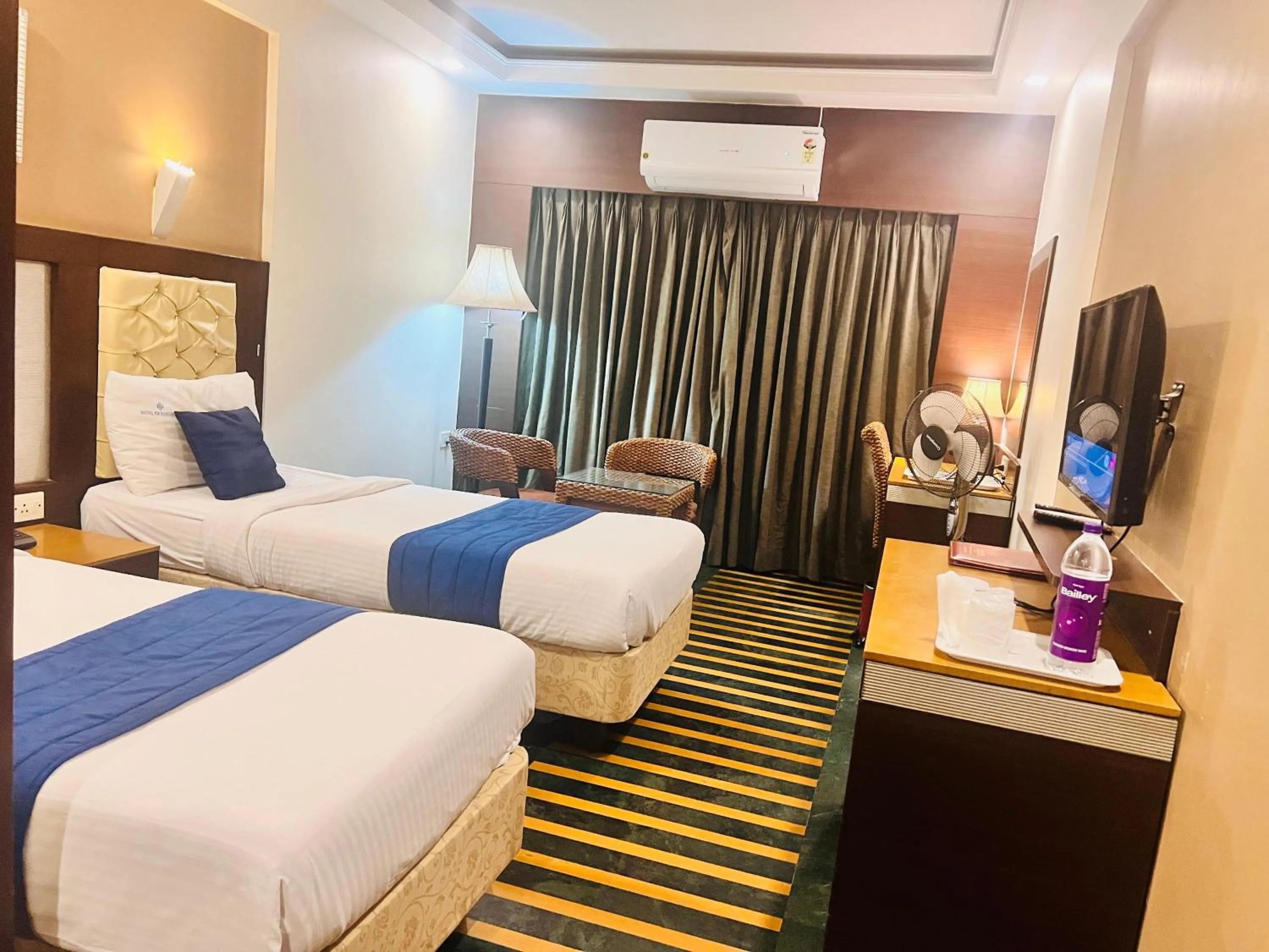 Bed in Hotel Dr Rajkumar International