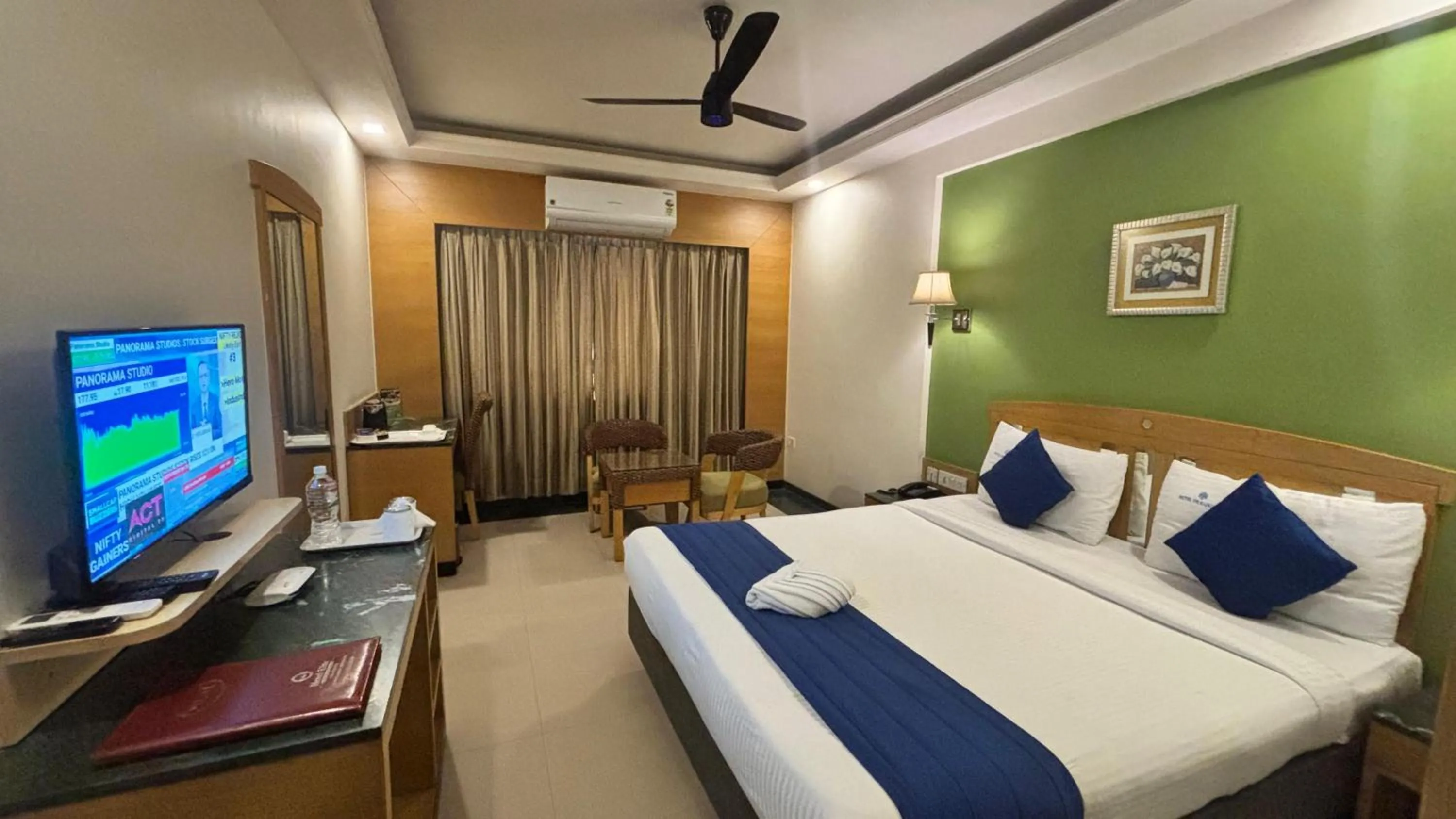 Bed in Hotel Dr Rajkumar International