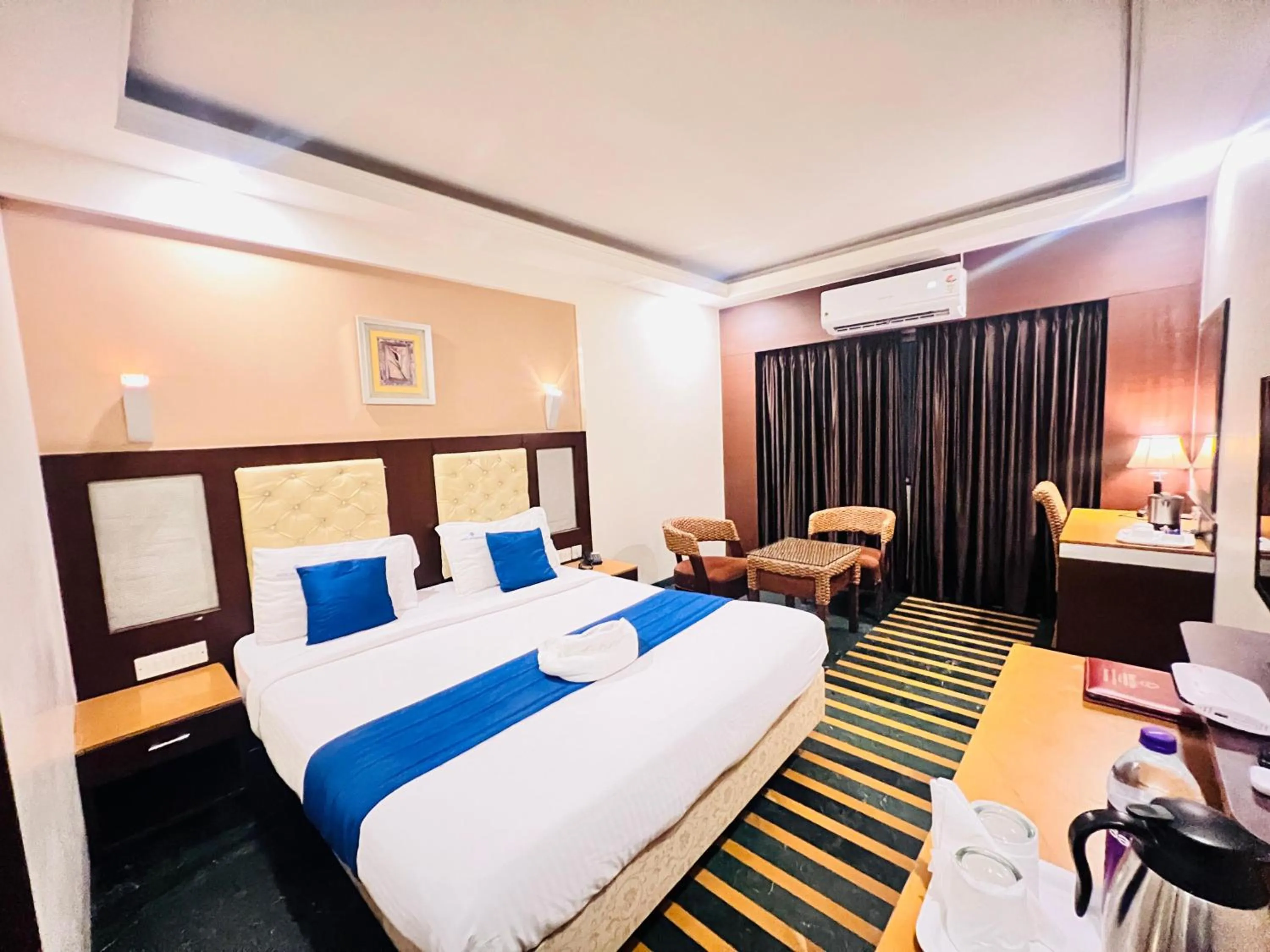 Bed in Hotel Dr Rajkumar International