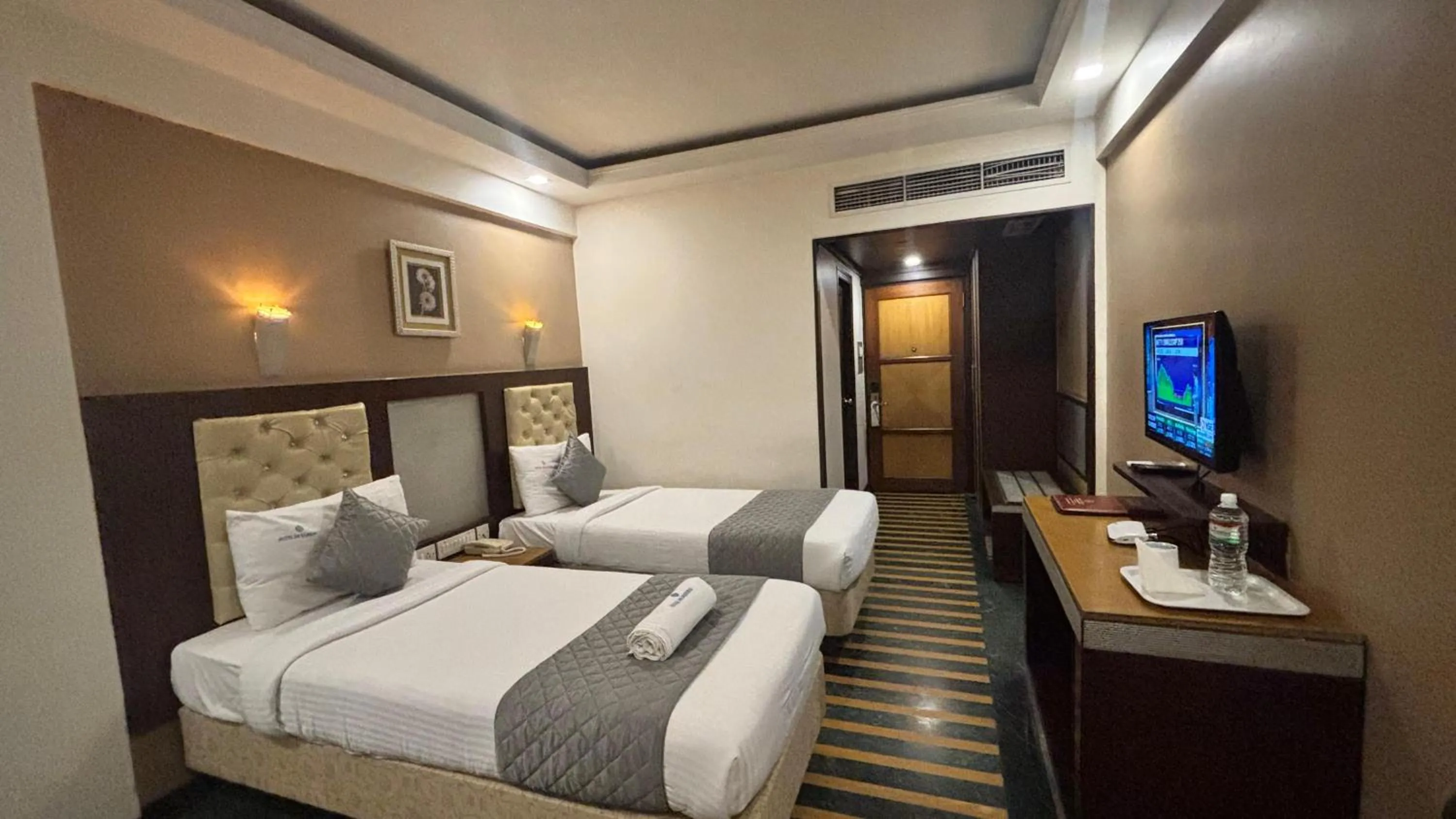 Bed in Hotel Dr Rajkumar International