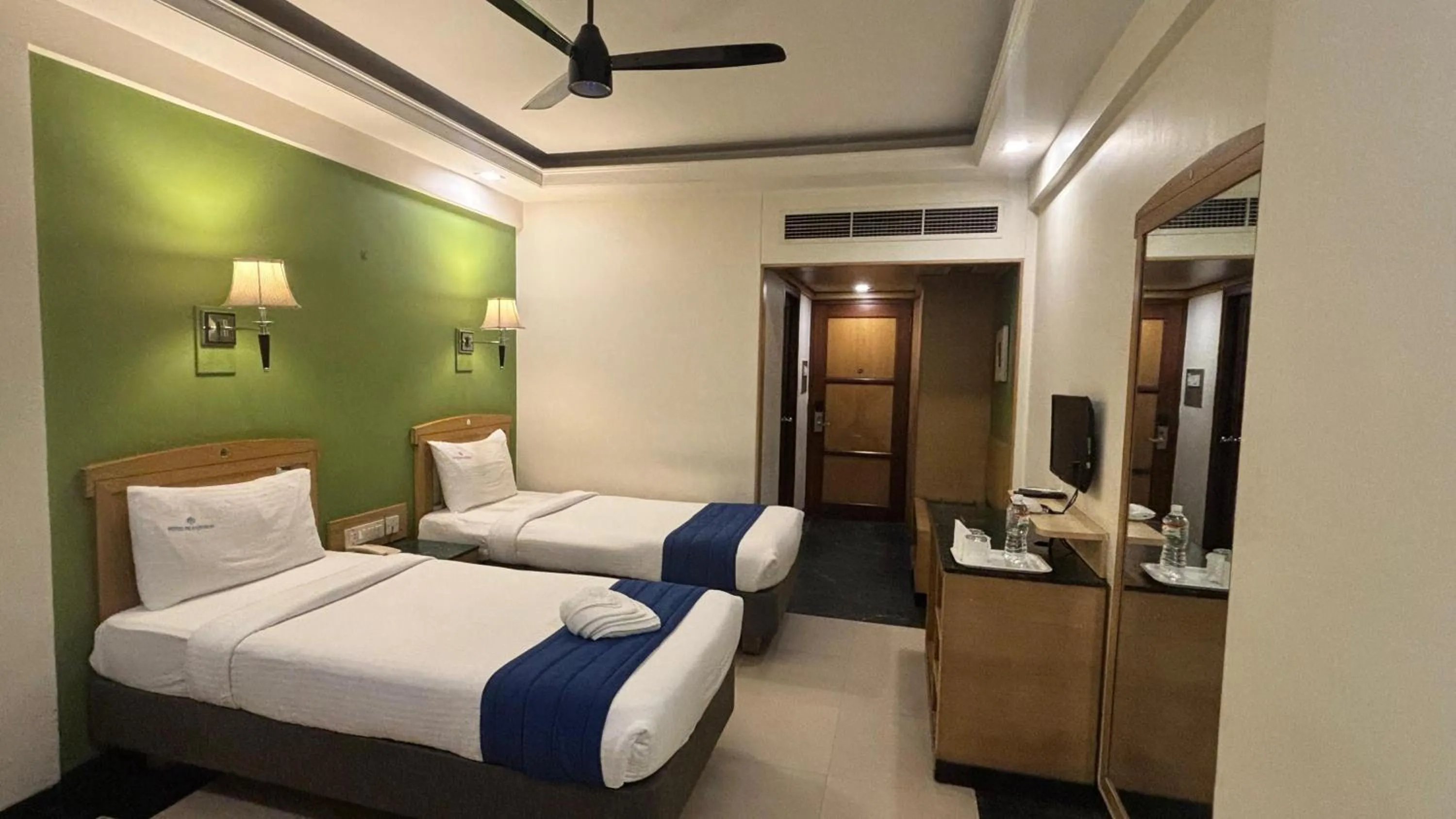 Bed in Hotel Dr Rajkumar International