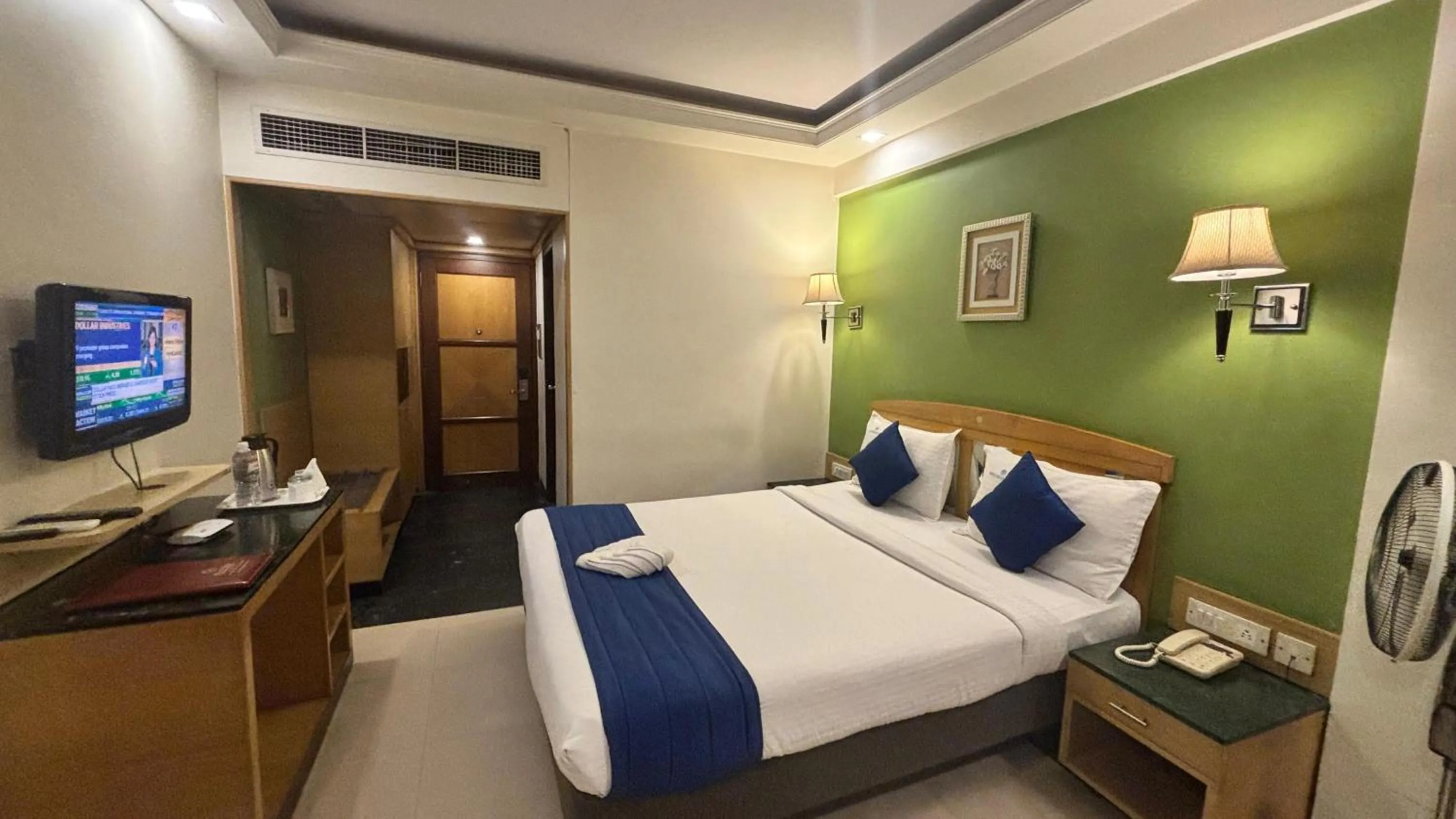 Bed in Hotel Dr Rajkumar International