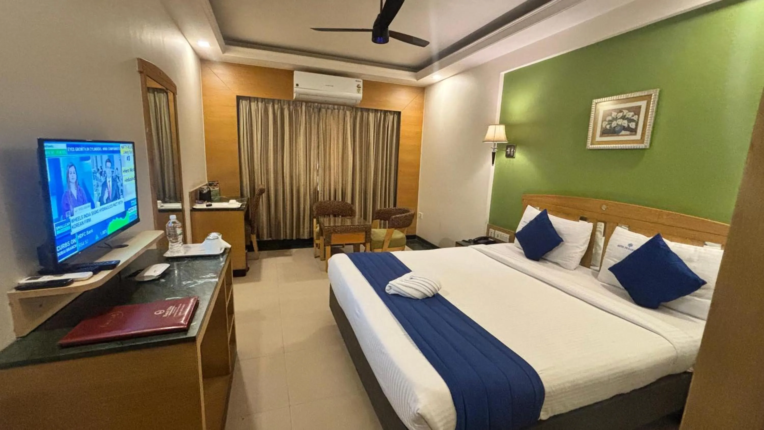 Bed in Hotel Dr Rajkumar International