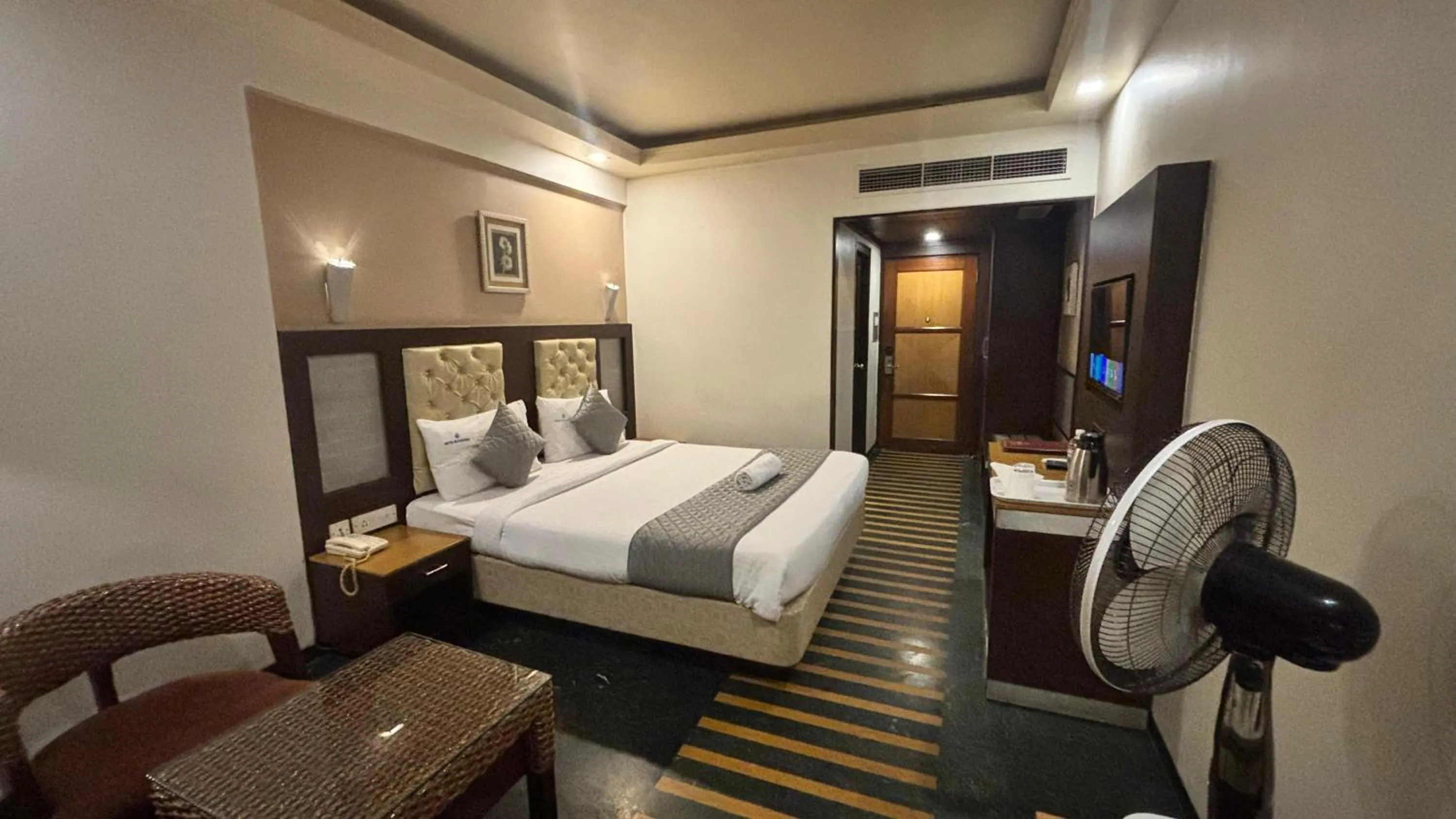 Bed in Hotel Dr Rajkumar International