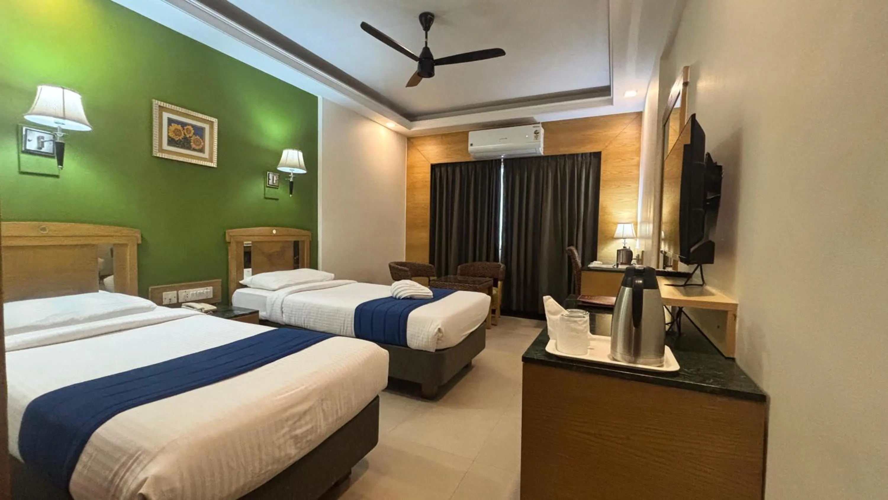 Bed in Hotel Dr Rajkumar International