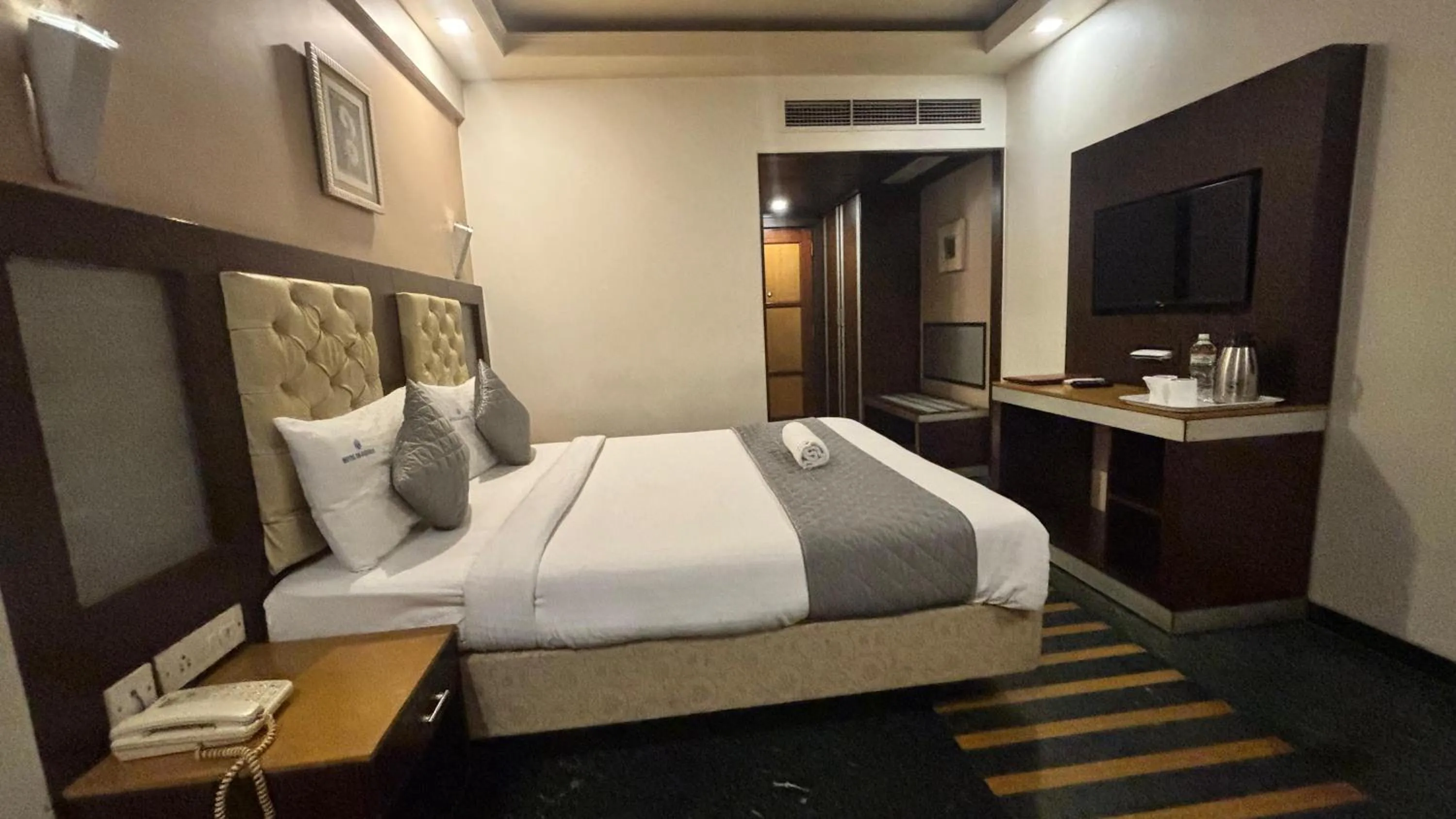 Bed in Hotel Dr Rajkumar International