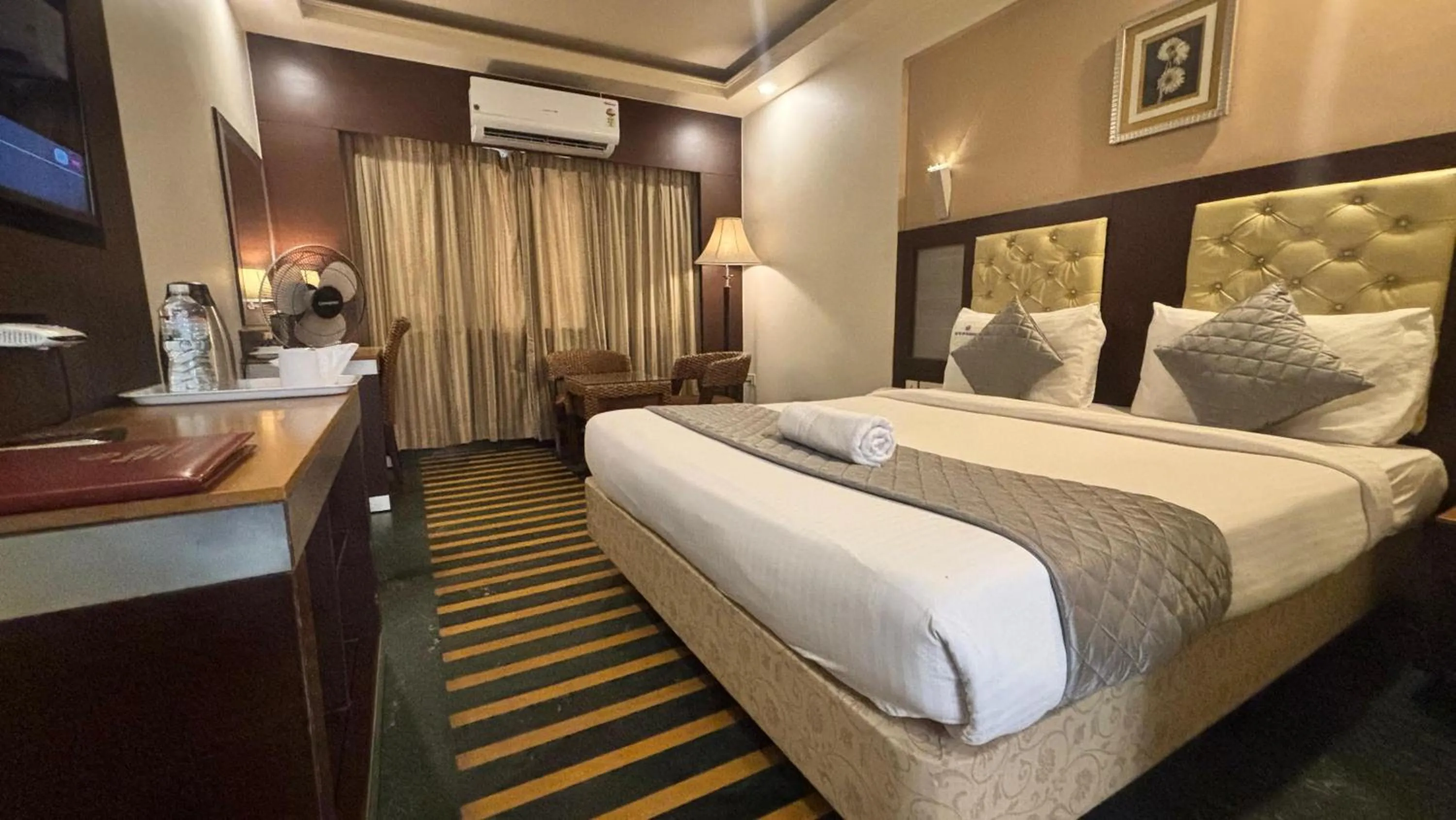 Bed in Hotel Dr Rajkumar International