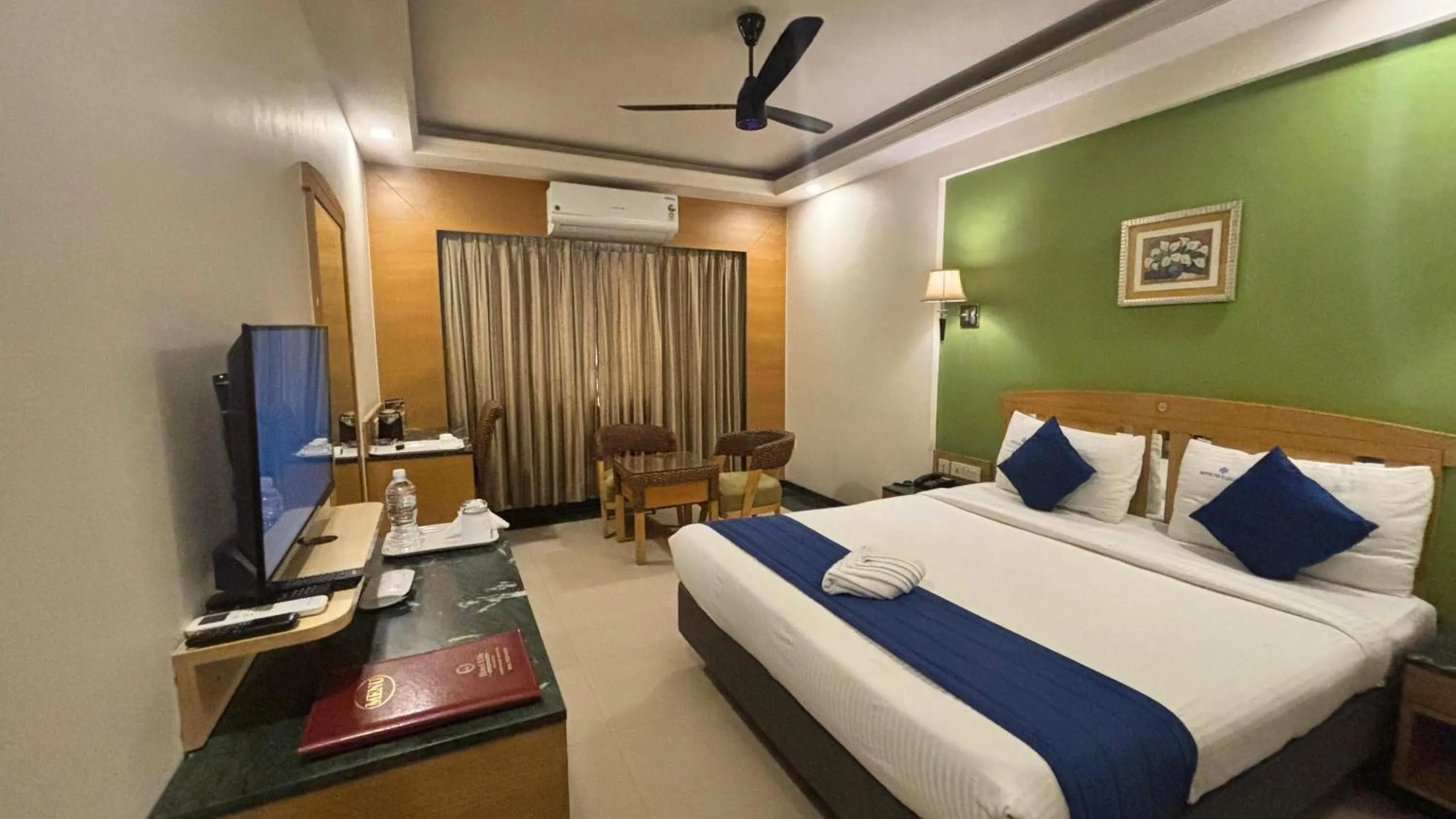 Bed in Hotel Dr Rajkumar International