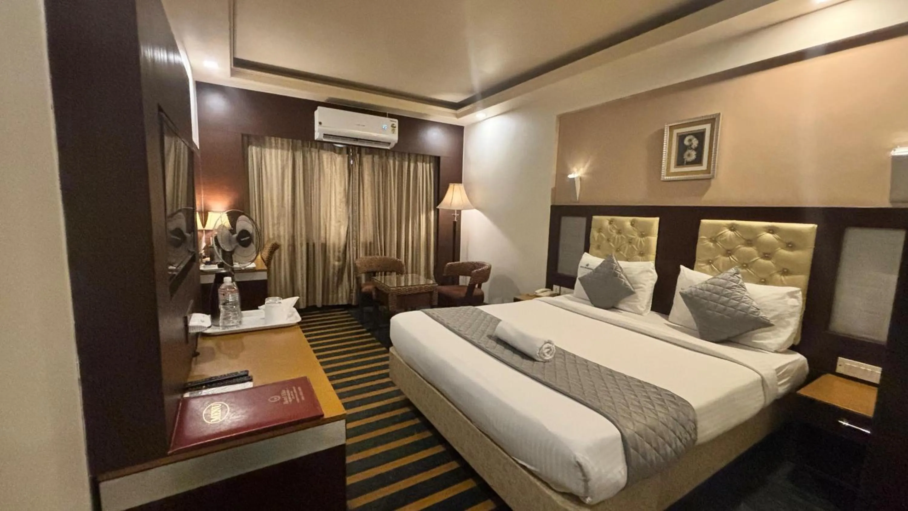 Bed in Hotel Dr Rajkumar International