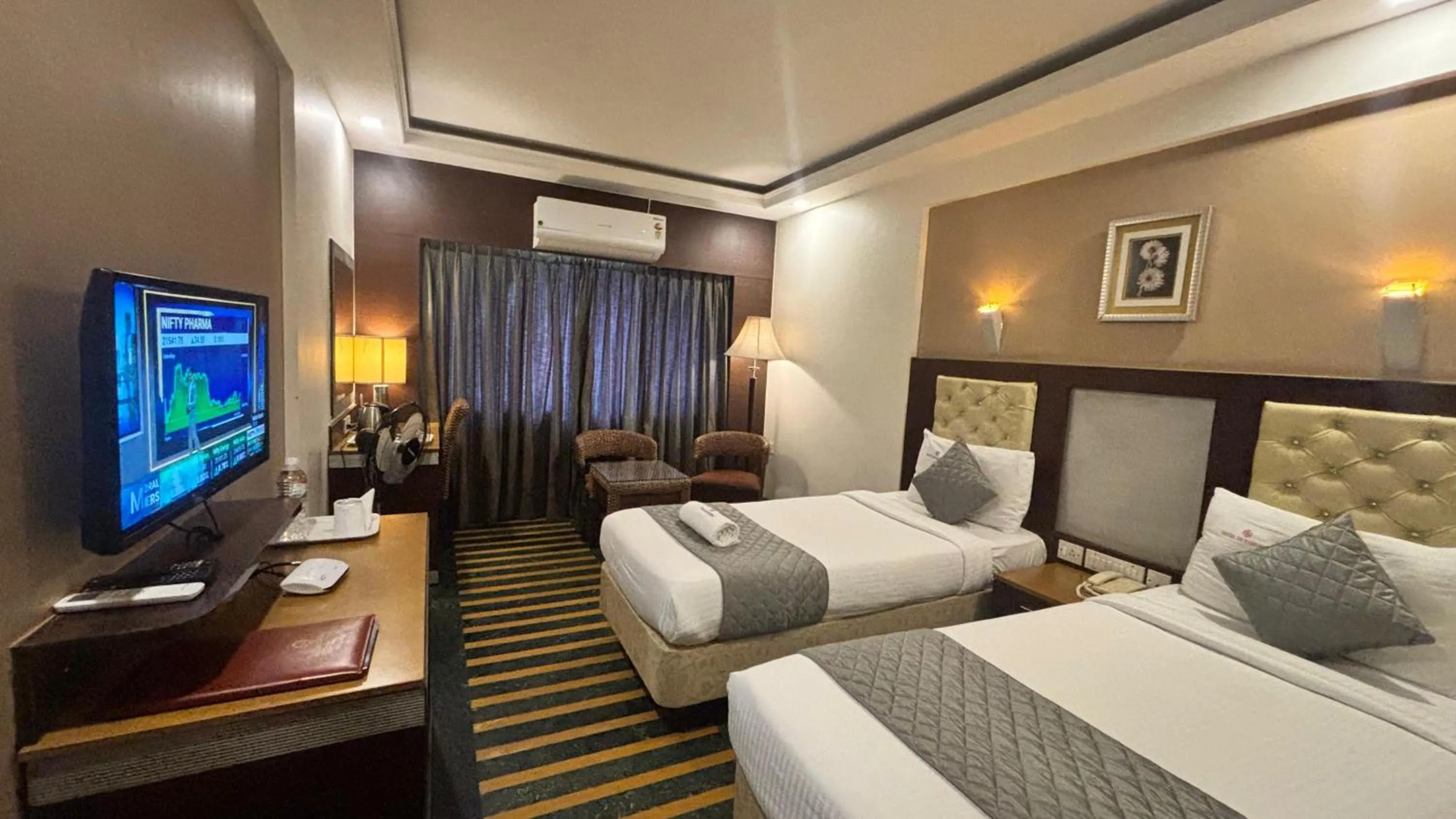 Bed in Hotel Dr Rajkumar International