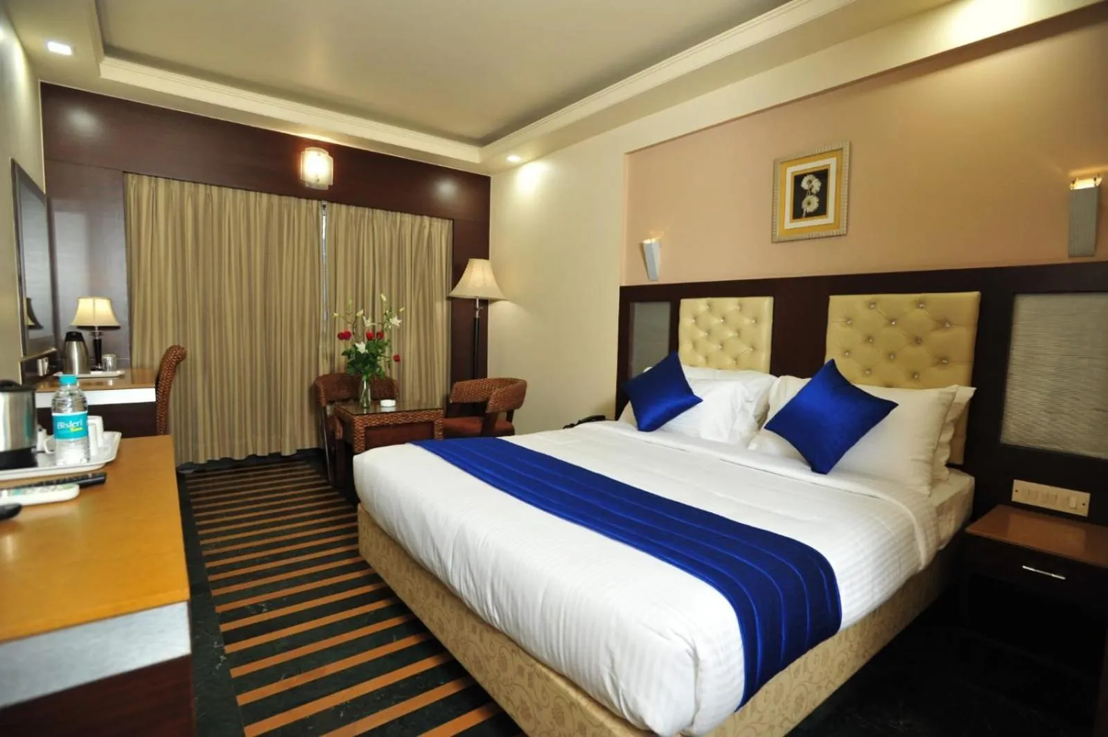 Bed in Hotel Dr Rajkumar International