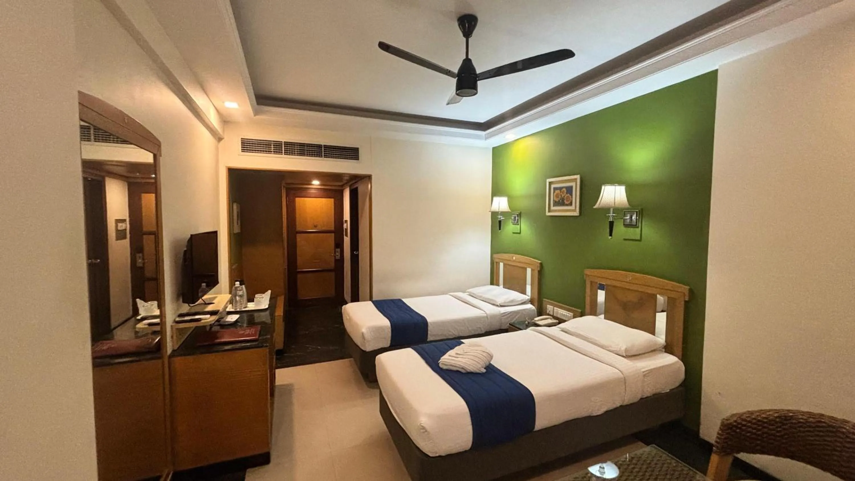 Photo of the whole room, Bed in Hotel Dr Rajkumar International