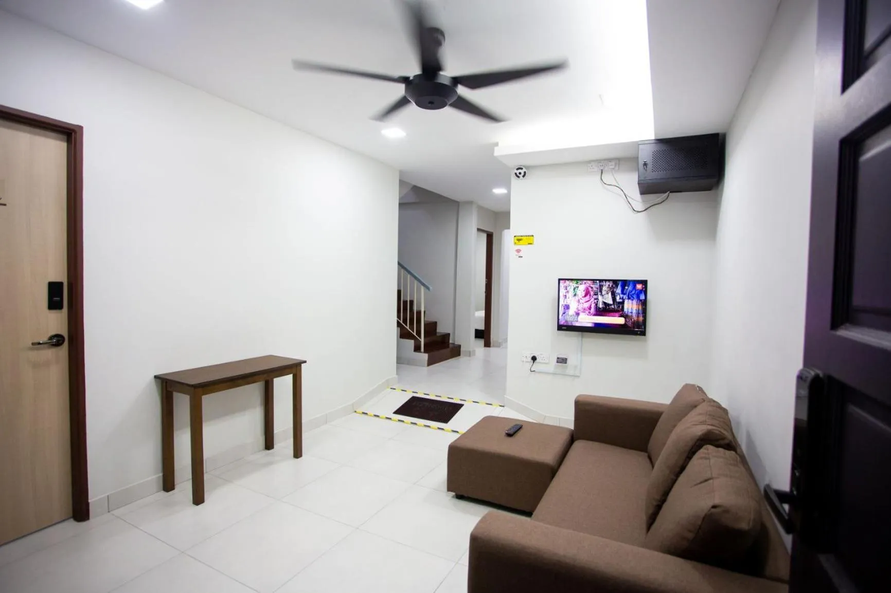 Communal lounge/ TV room in Hom2rex Kuching Homestay Taman Timberland