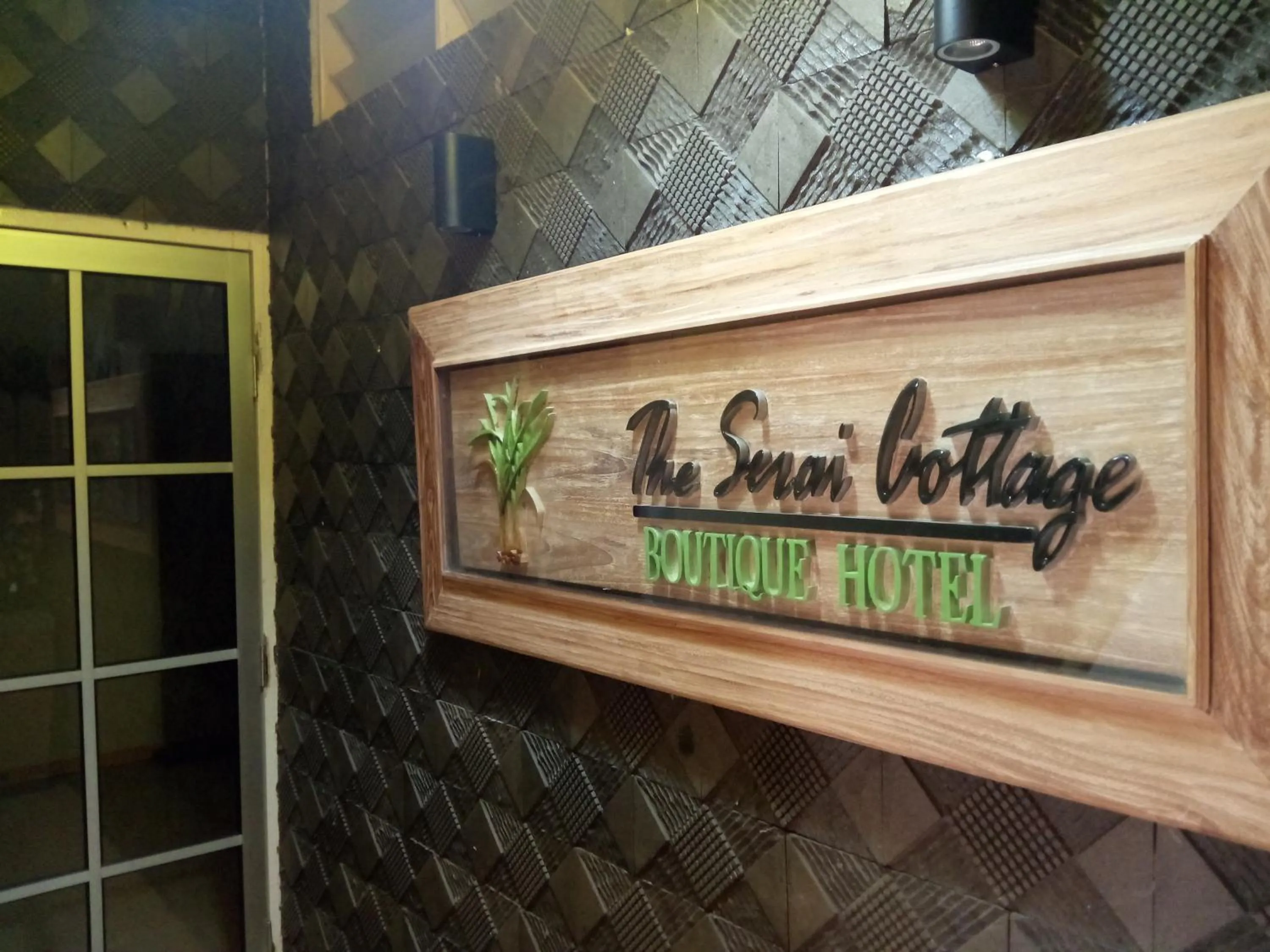 Property logo or sign in The Serai Cottage Transit Hotel