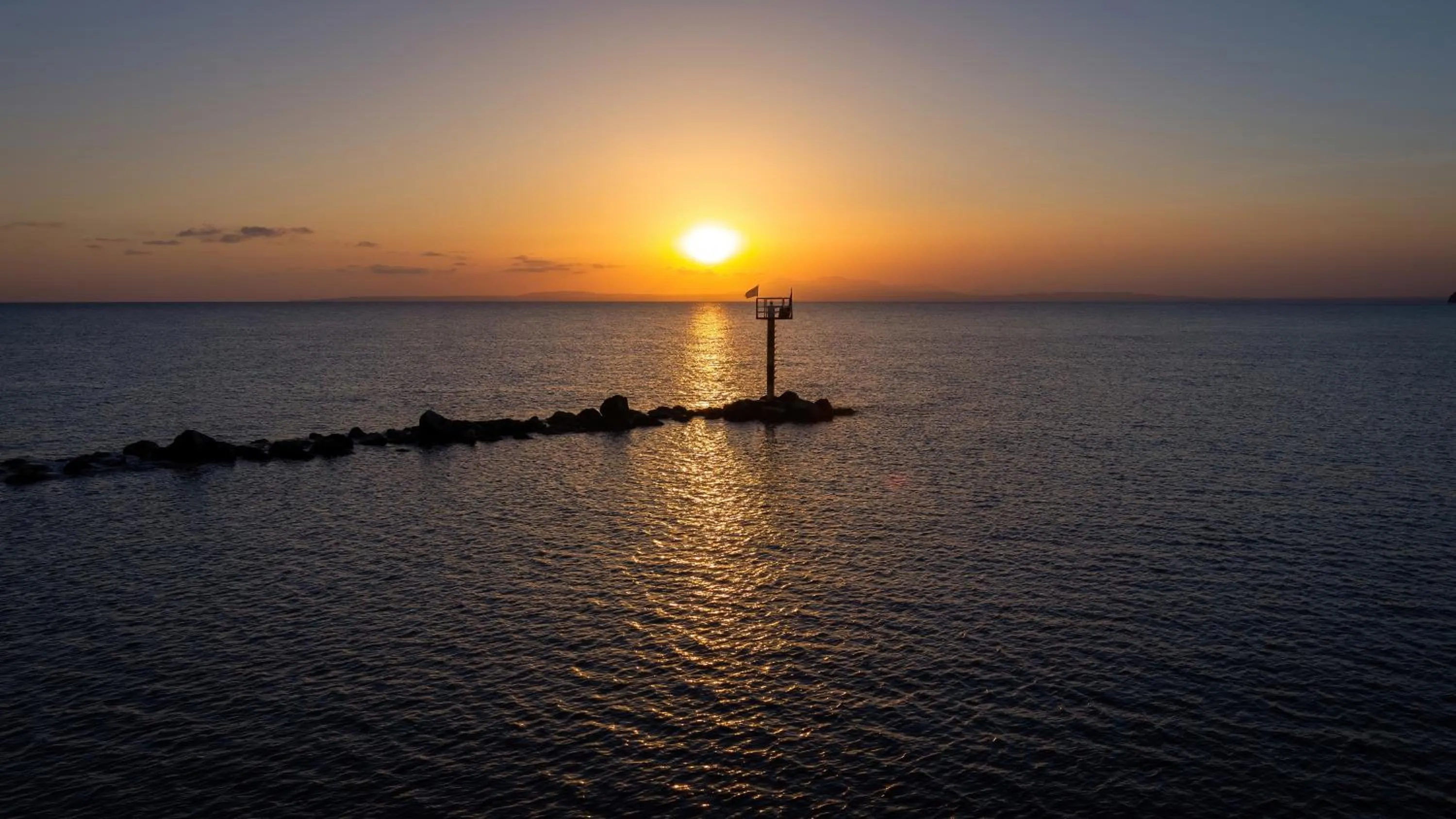 Sunset in Tylos Beach Hotel