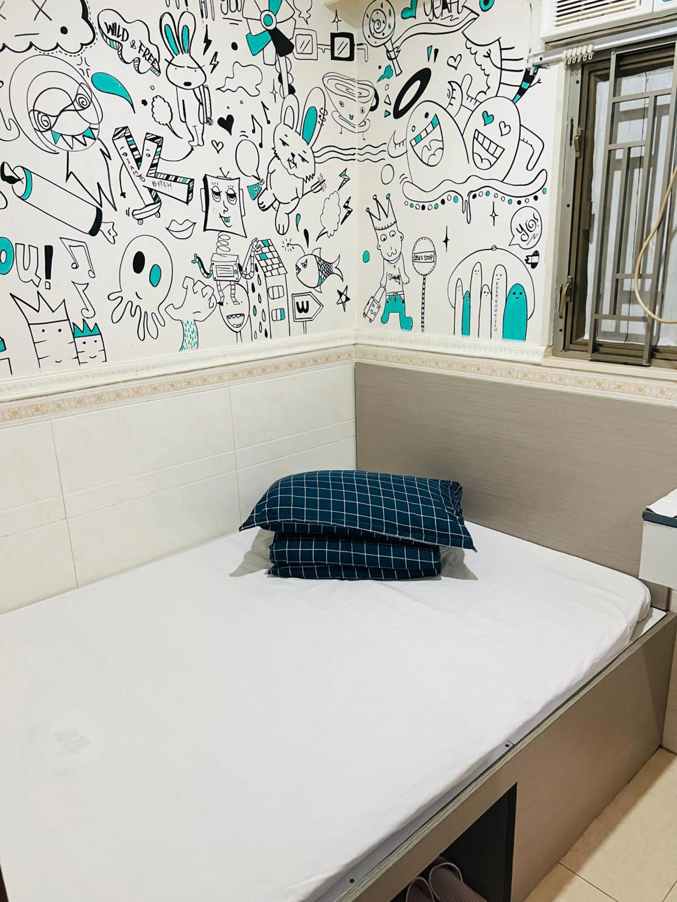 Bed in 嘉應賓館HAKKAS GUEST House