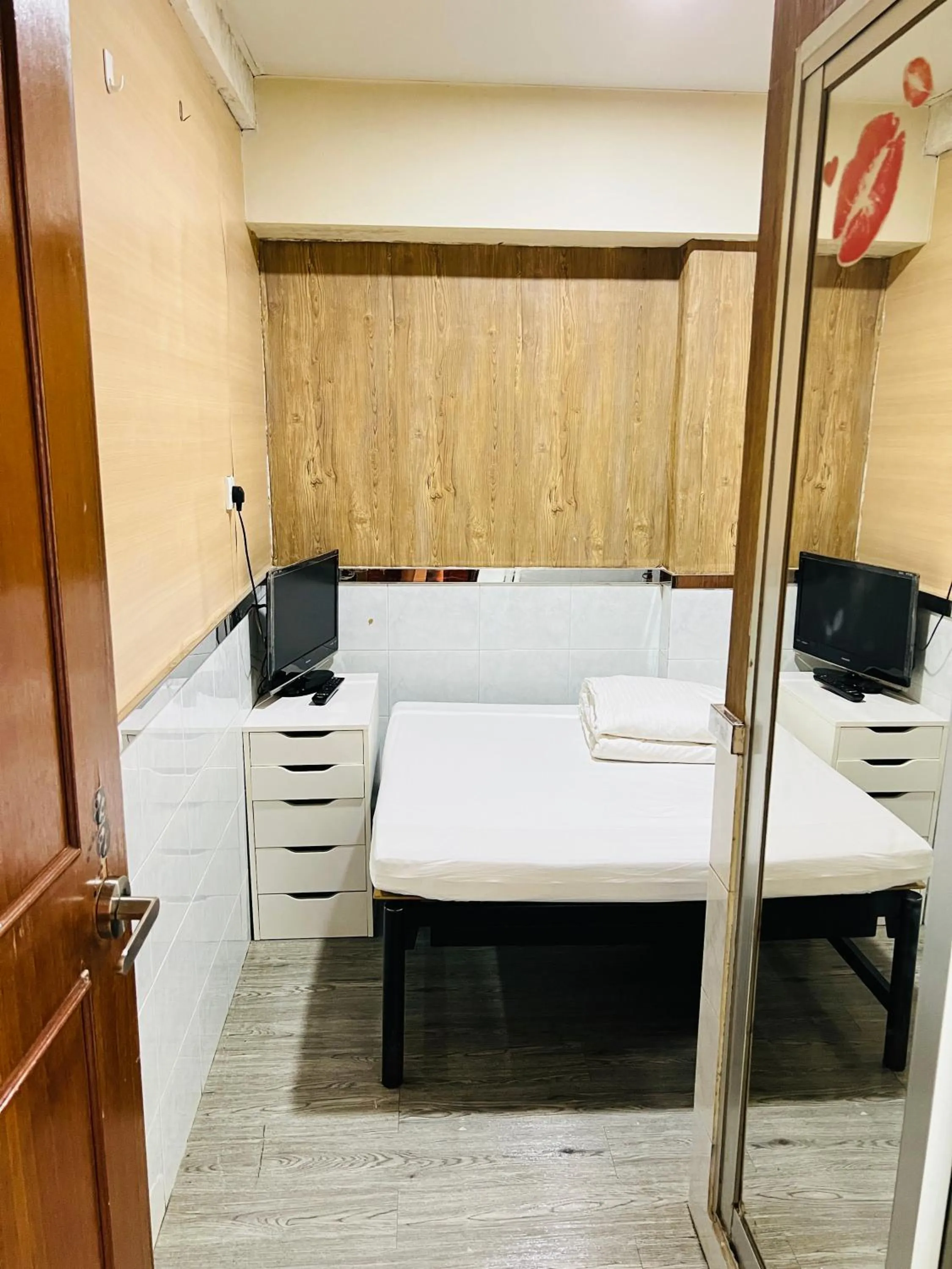 Bed in 嘉應賓館HAKKAS GUEST House