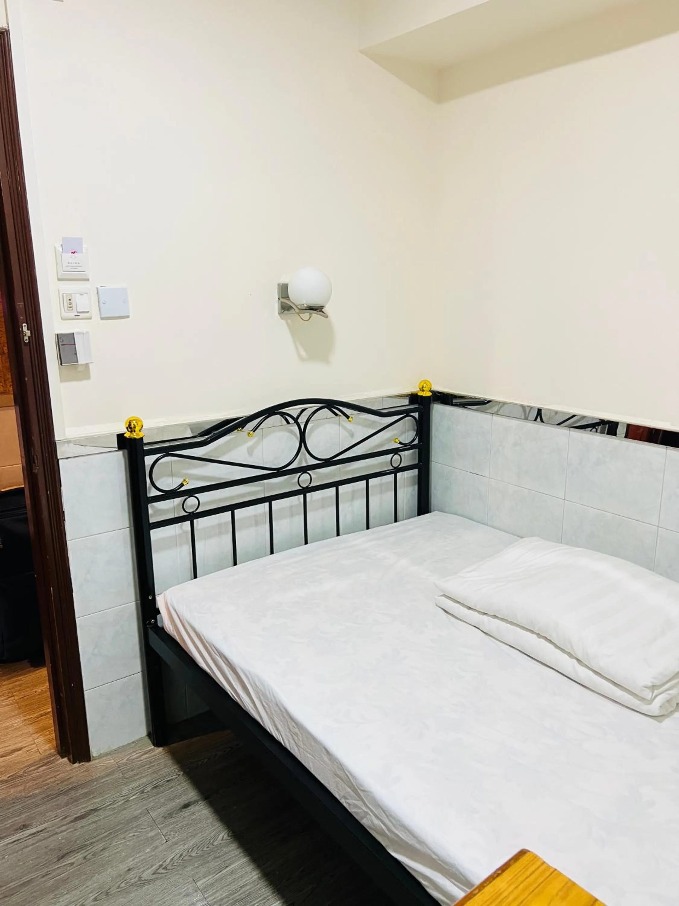 Bed in 嘉應賓館HAKKAS GUEST House