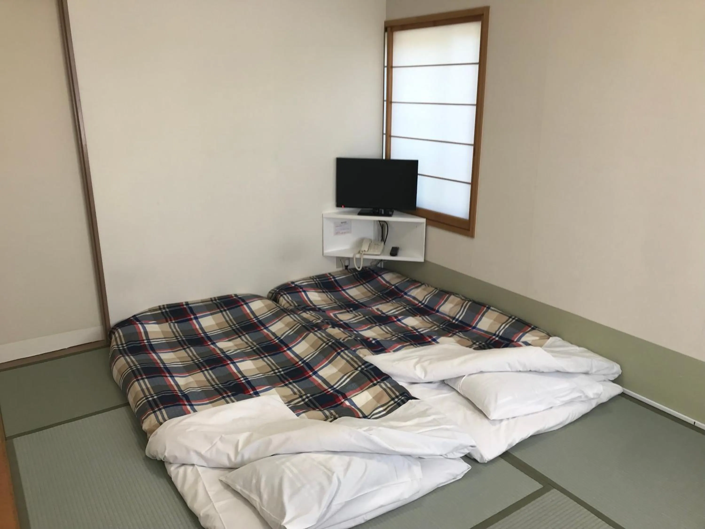 Bed in Fujibou Hotel