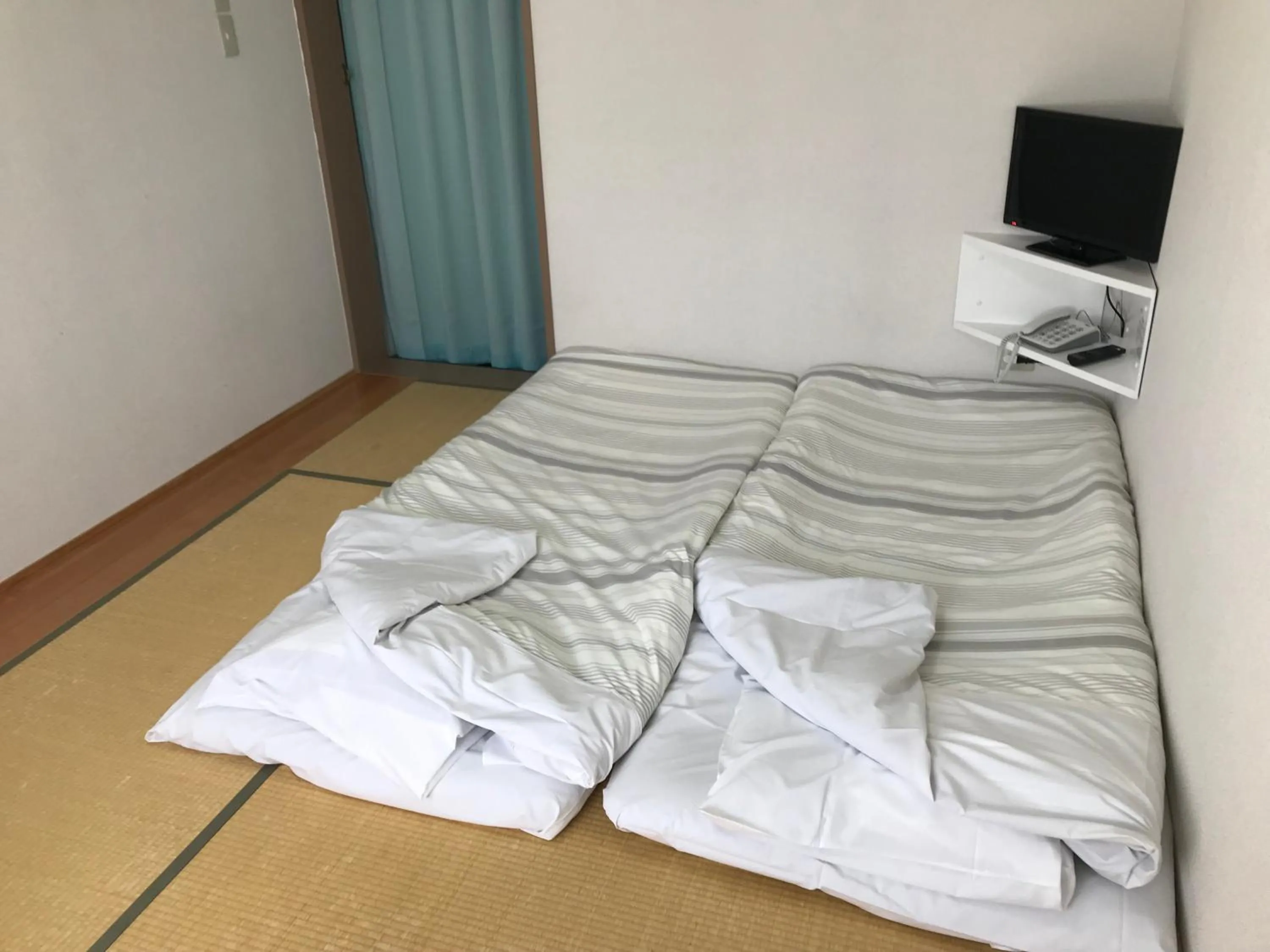 Bed in Fujibou Hotel