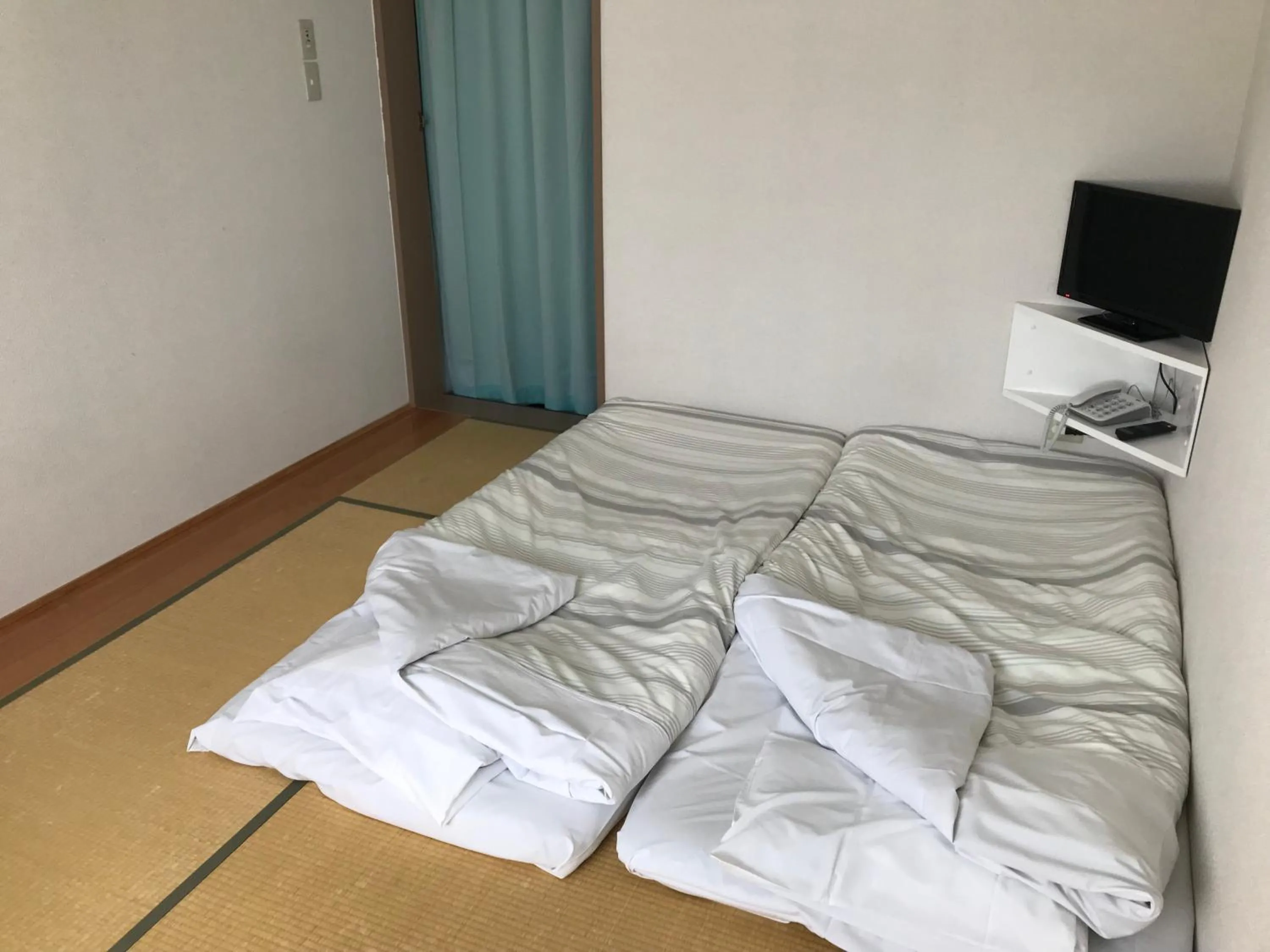 Bed in Fujibou Hotel