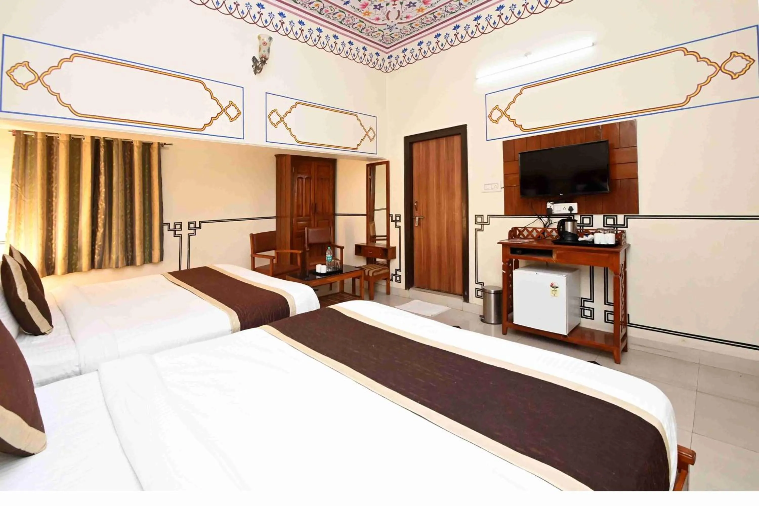 Bed in Virasat Mahal Heritage Hotel-Jaipur City Center