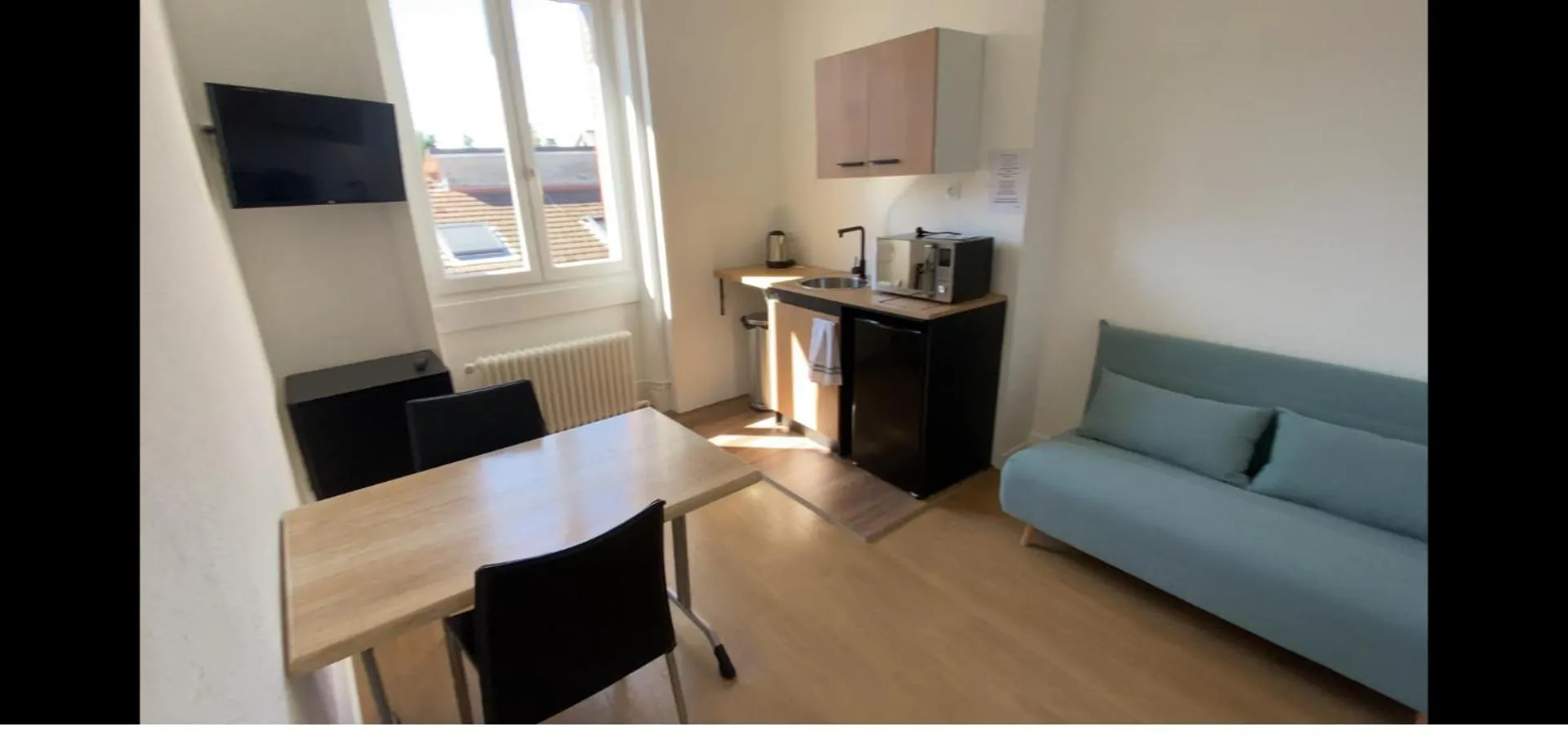 Kitchen or kitchenette in Hôtel Brasserie Le Lion d'Or