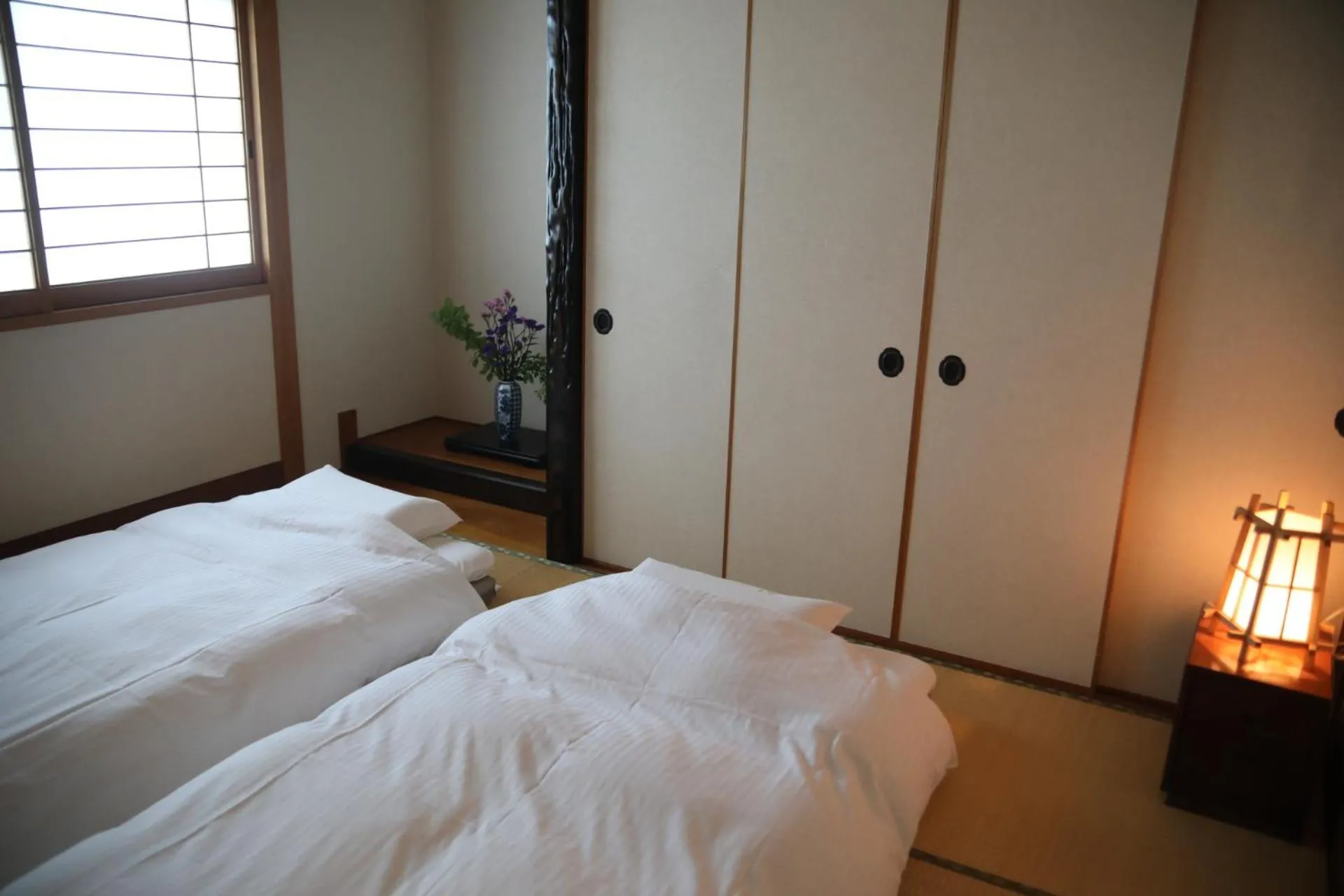 Bedroom, Bed in Stay Omihachiman Ekimae Inn