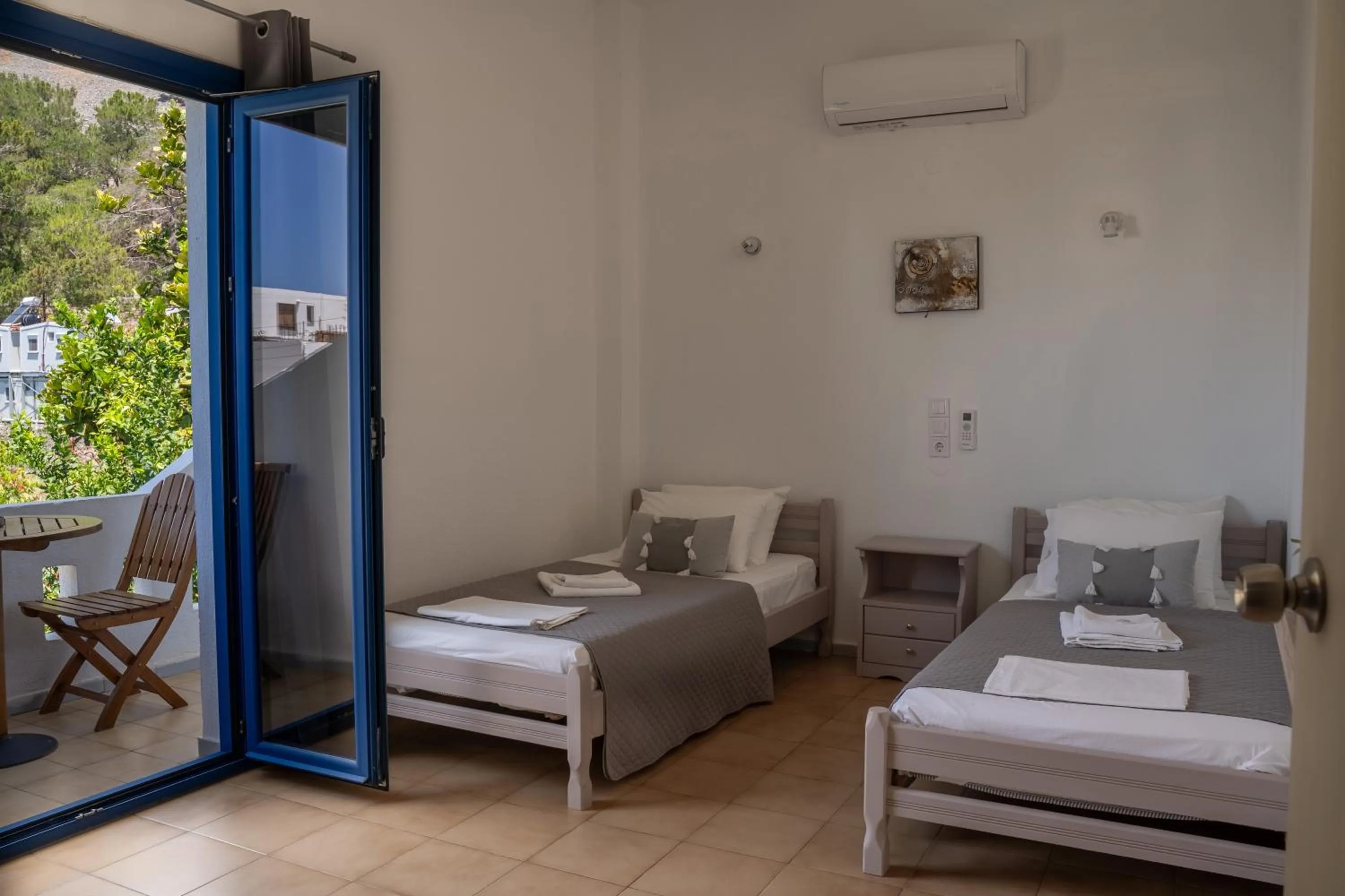 Bed in Giannis Rooms