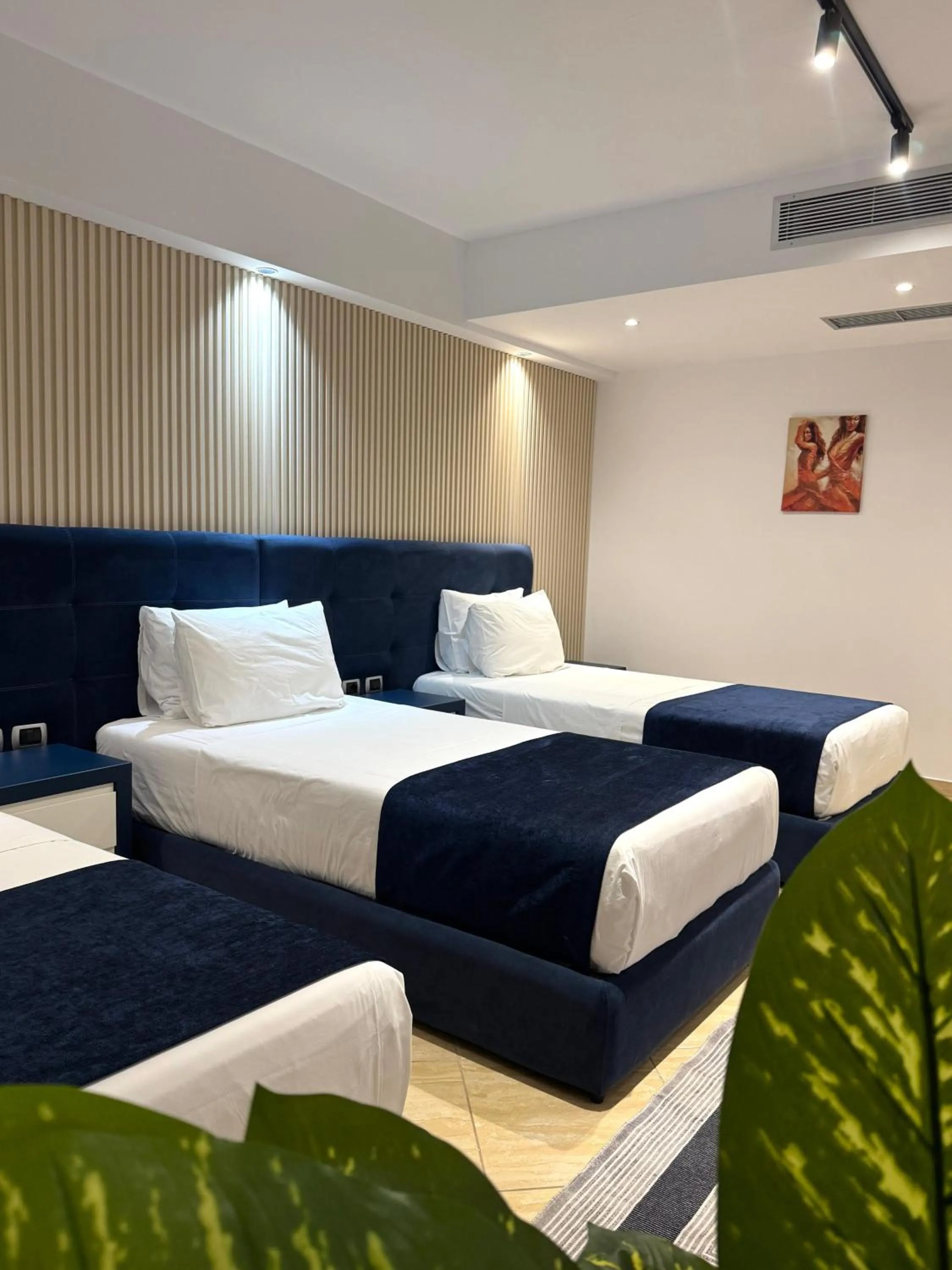 Property building, Bed in Hotel Blue Sky